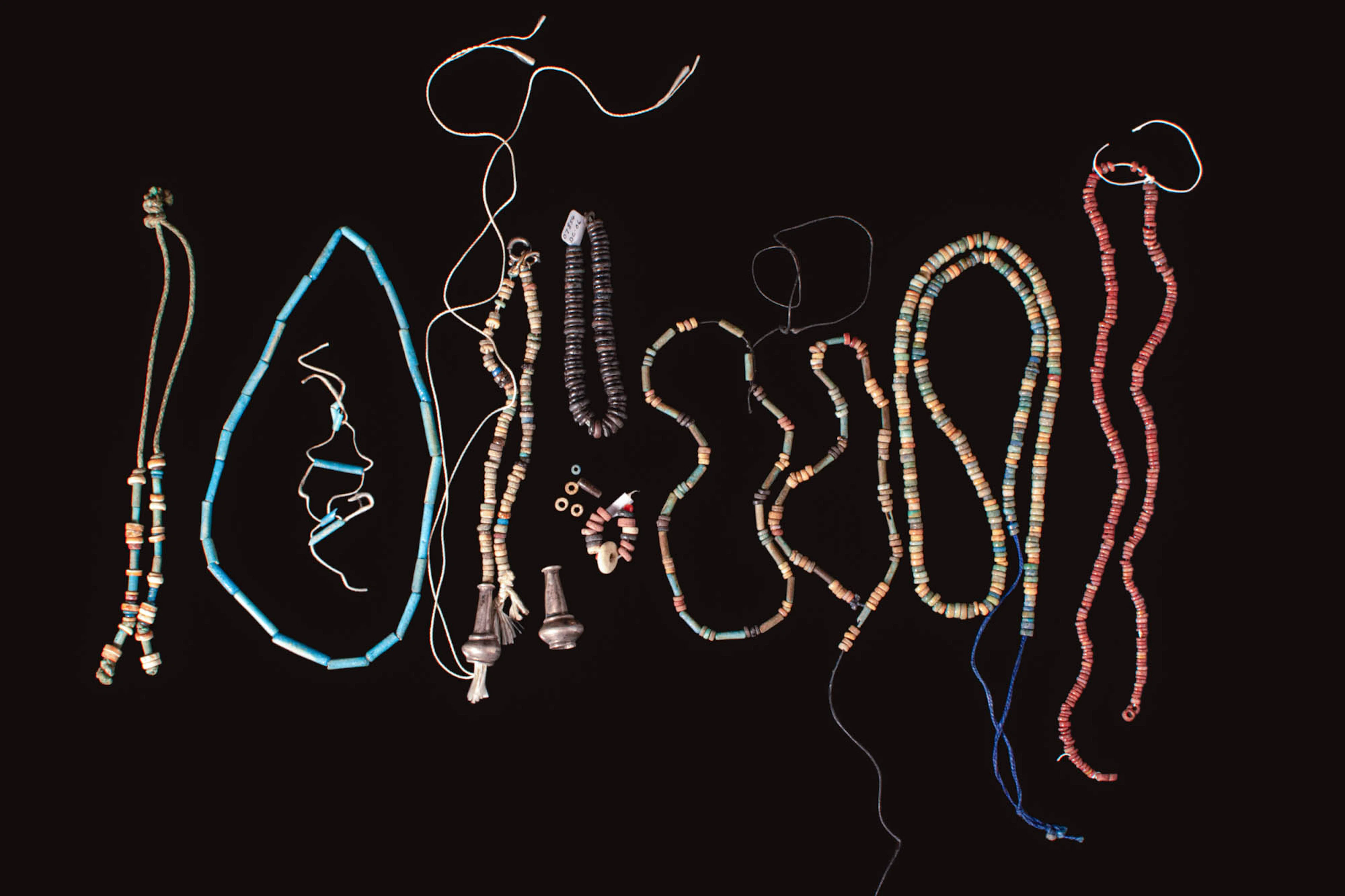 COLLECTION OF EGYPTIAN FAIENCE NECKLACES AND BEADS