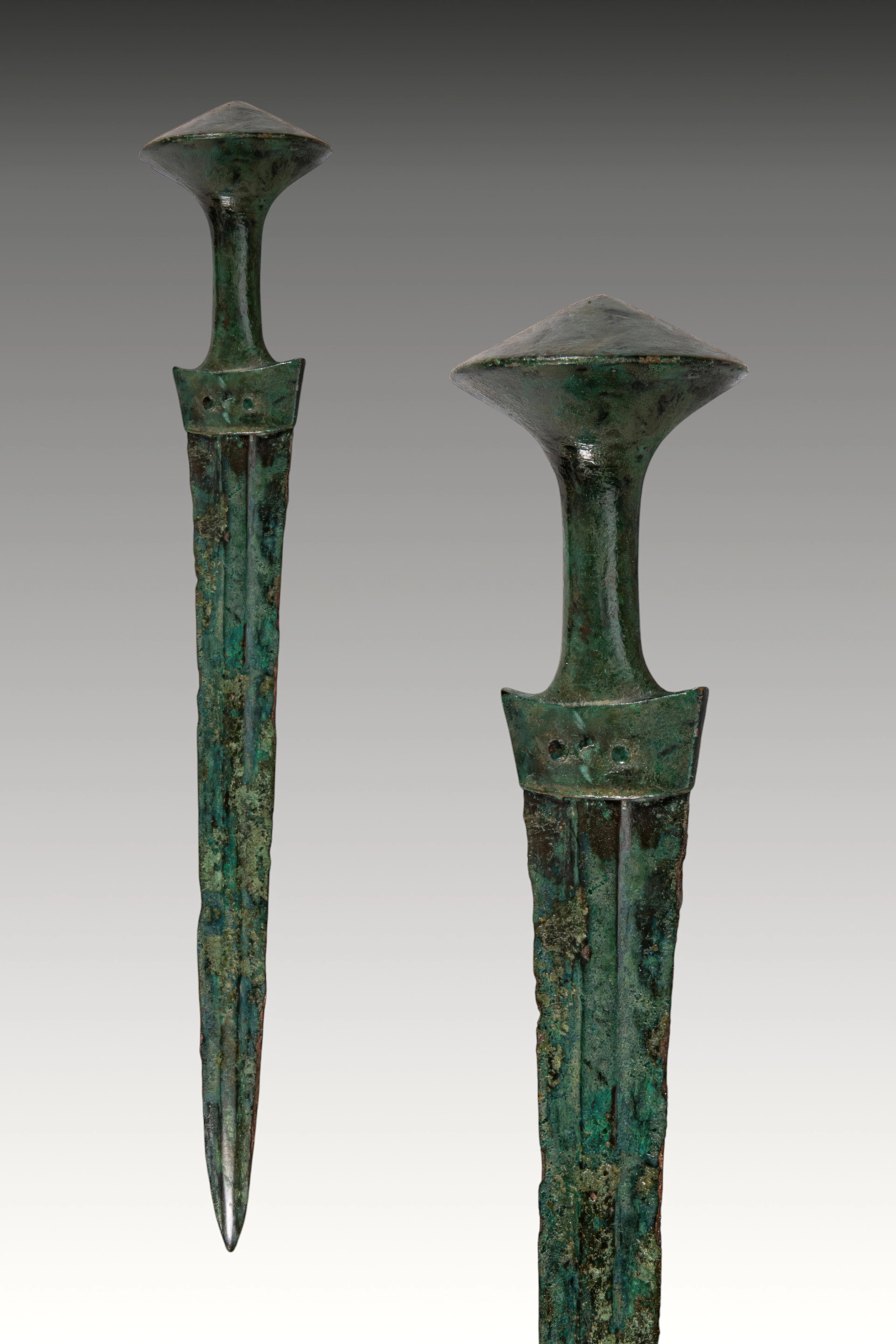 MYCENAEAN BRONZE SWORD WITH BICONICAL POMMEL