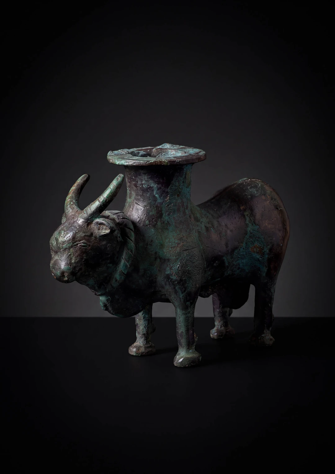 LATE ELAMITE BRONZE FIGURAL VESSEL IN THE FORM OF A BULL