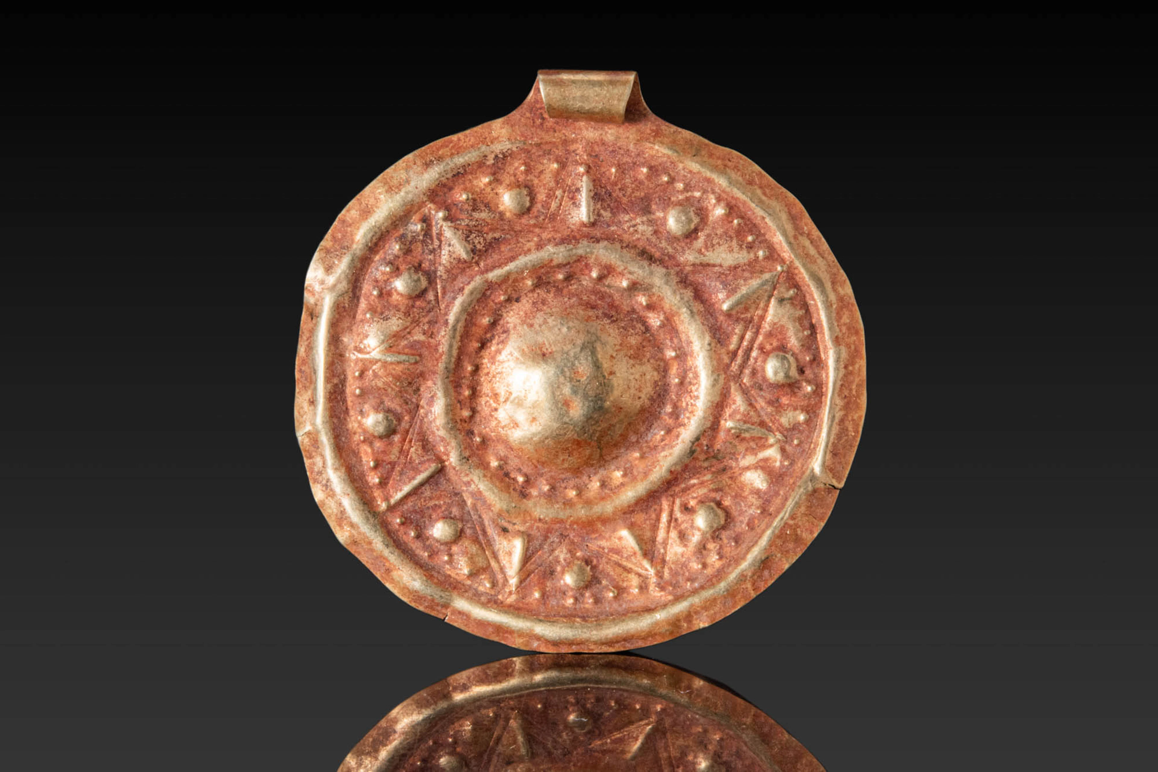 ANCIENT GREEK HIGH KARAT GOLD PENDANT WITH SUN MOTIF