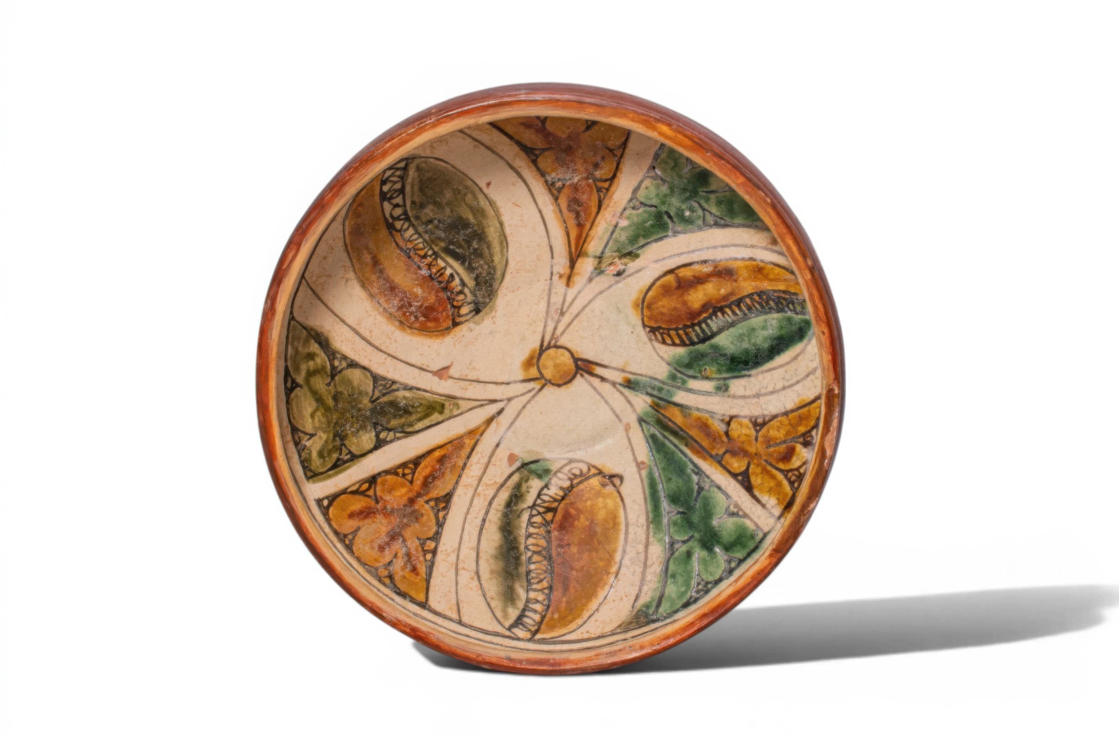 BYZANTINE GLAZED TERRACOTTA BOWL WITH FLORAL AND GEOMETRIC MOTIFS
