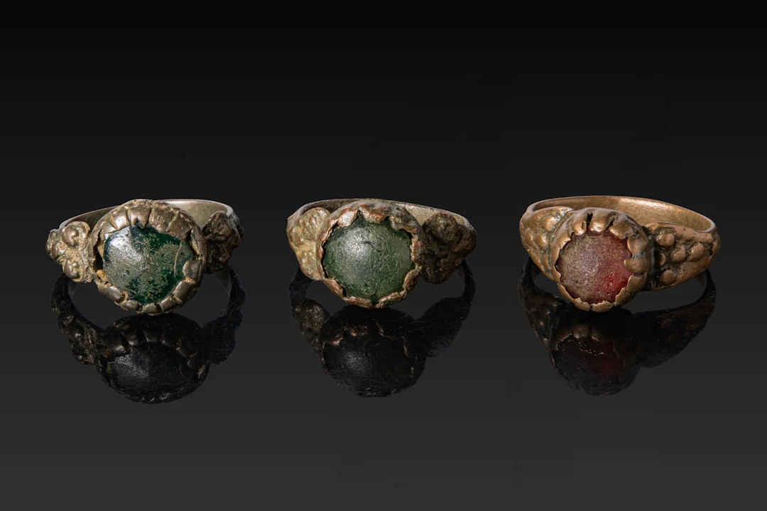 COLLECTION OF MEDIEVAL BRONZE RINGS WITH CABOCHONS
