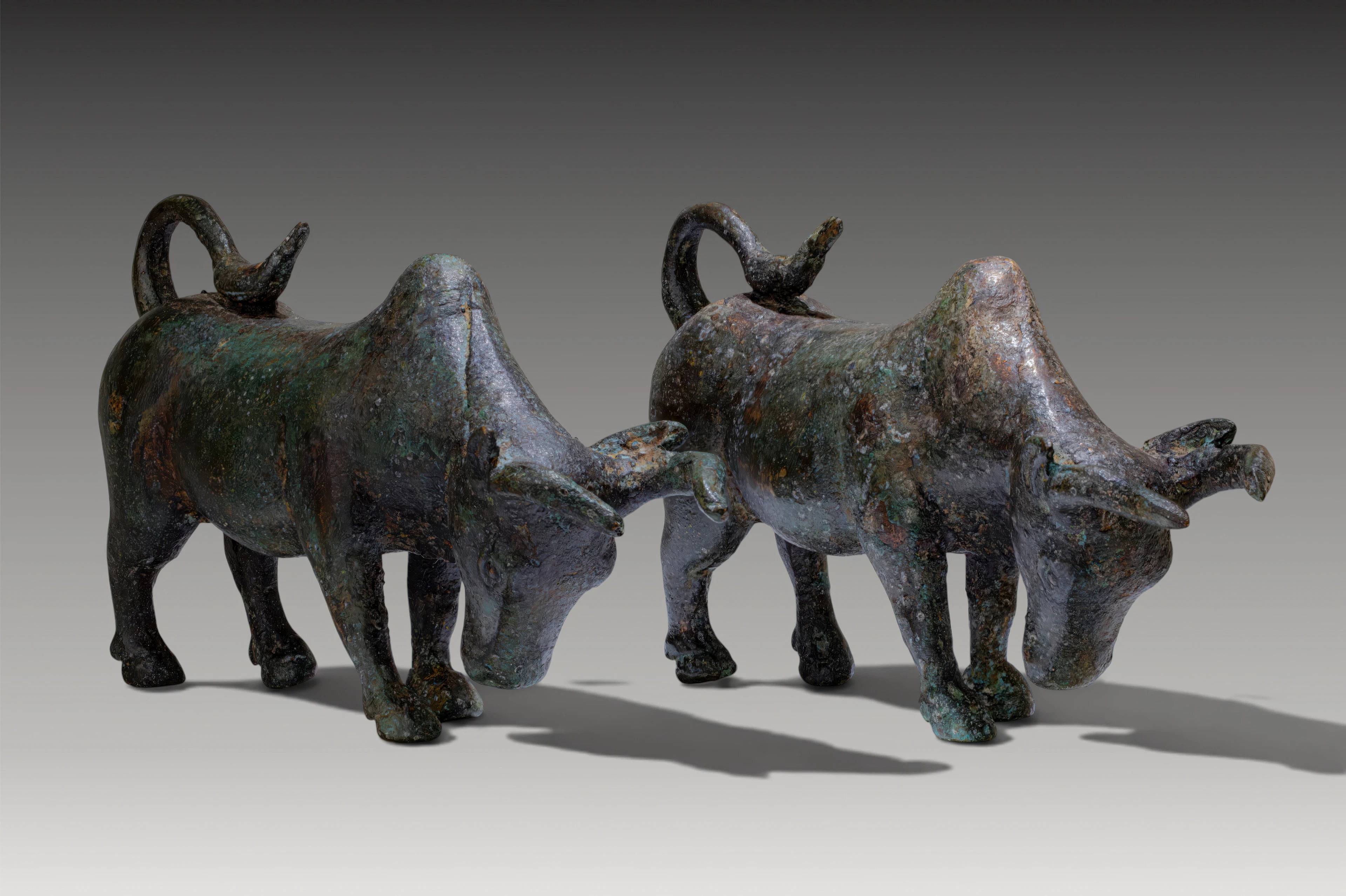 PAIR OF ROMAN BRONZE BULL FIGURINES
