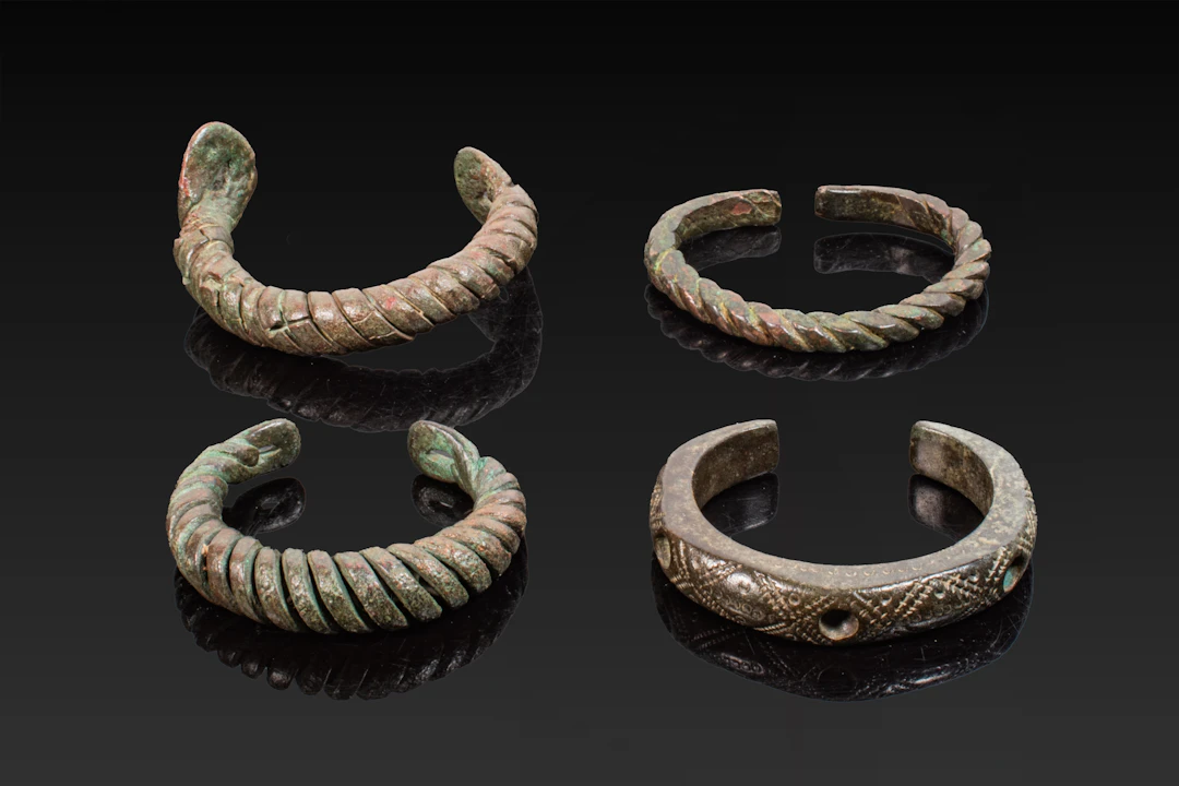COLLECTION OF CELTIC BRONZE BANGLES