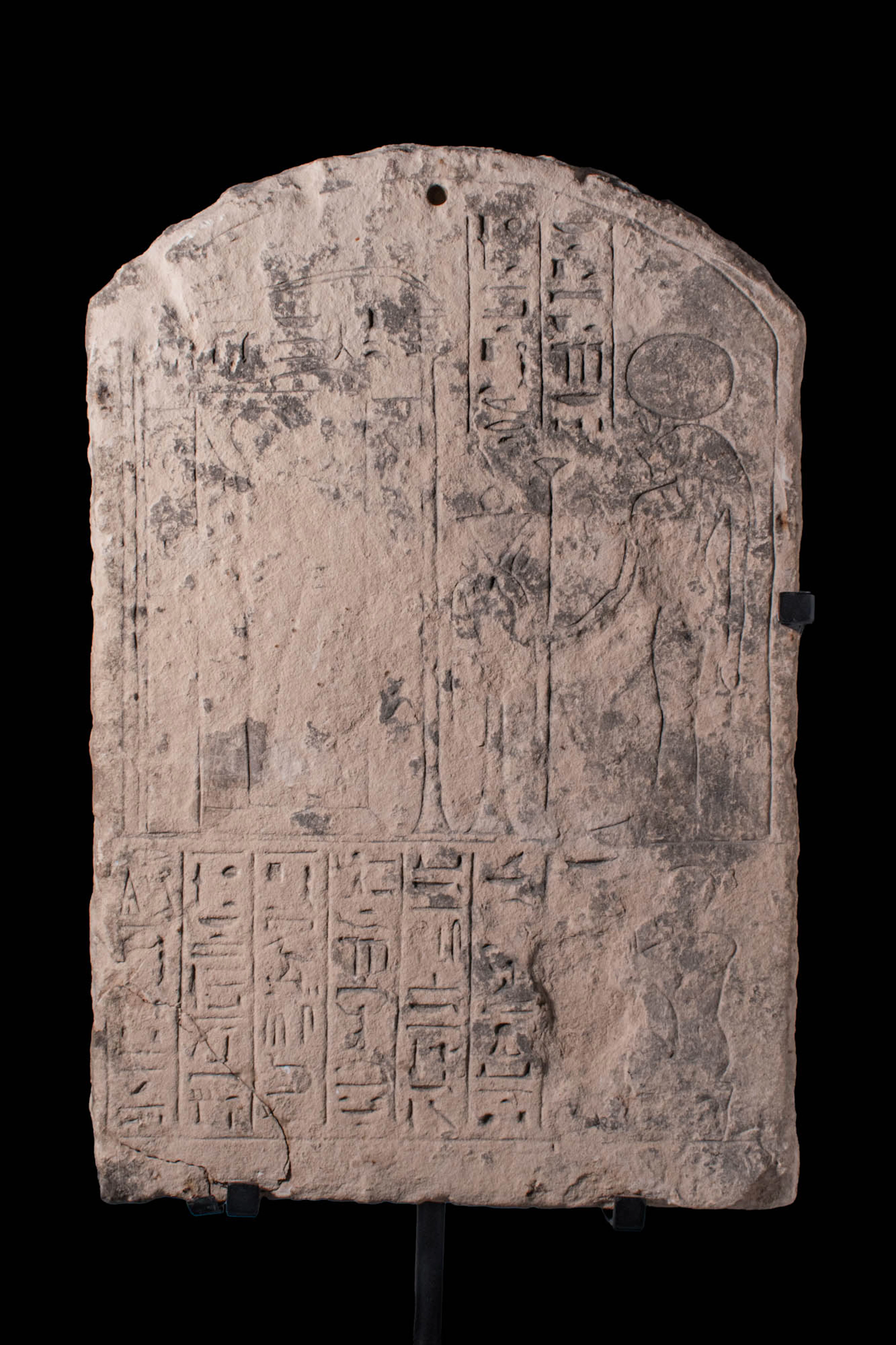 EGYPTIAN SANDSTONE VOTIVE STELA OF THE PRIEST DJEHUTYMOSE DEDICATED