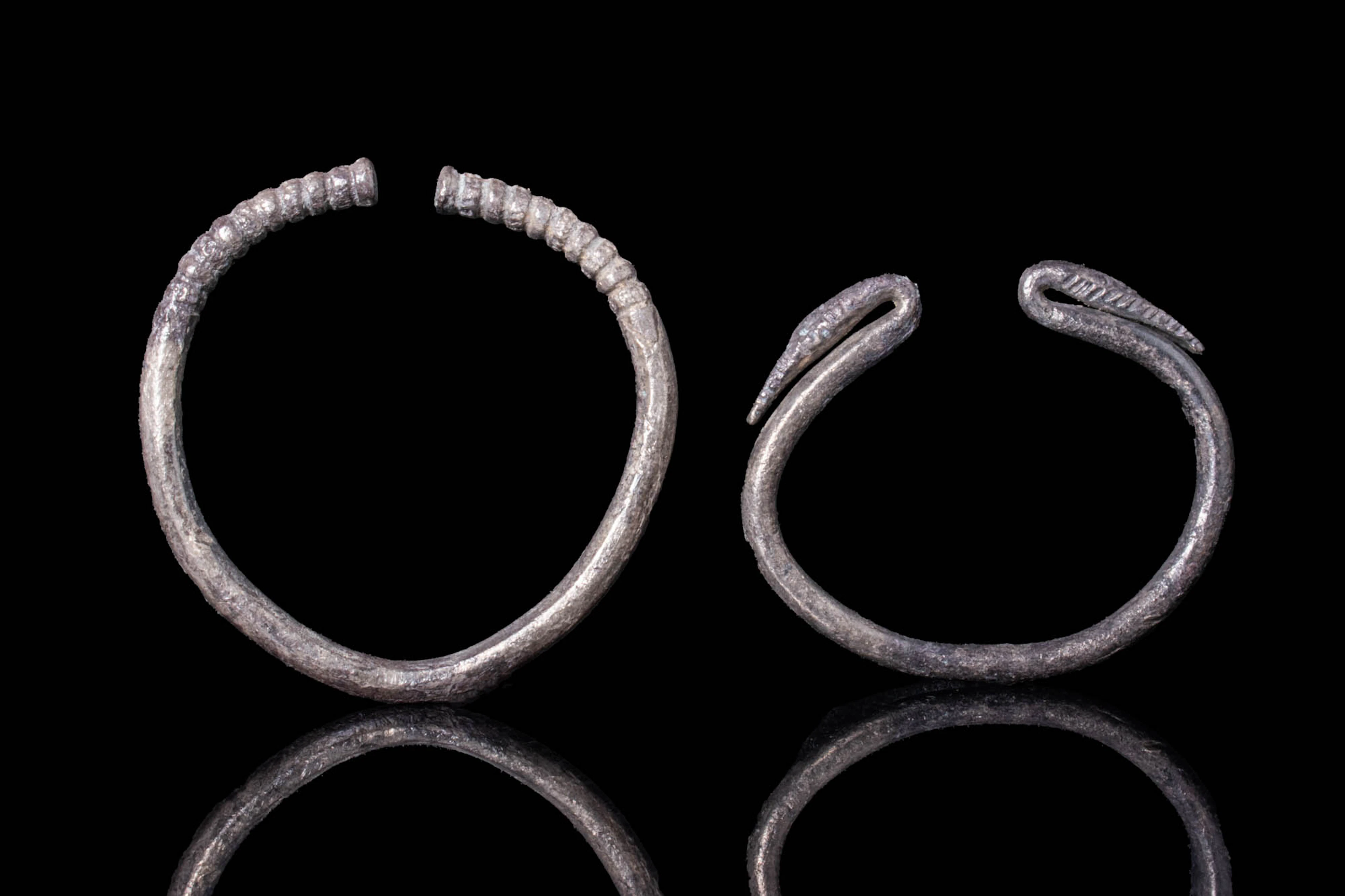PAIR OF CELTIC SILVER BRACELETS