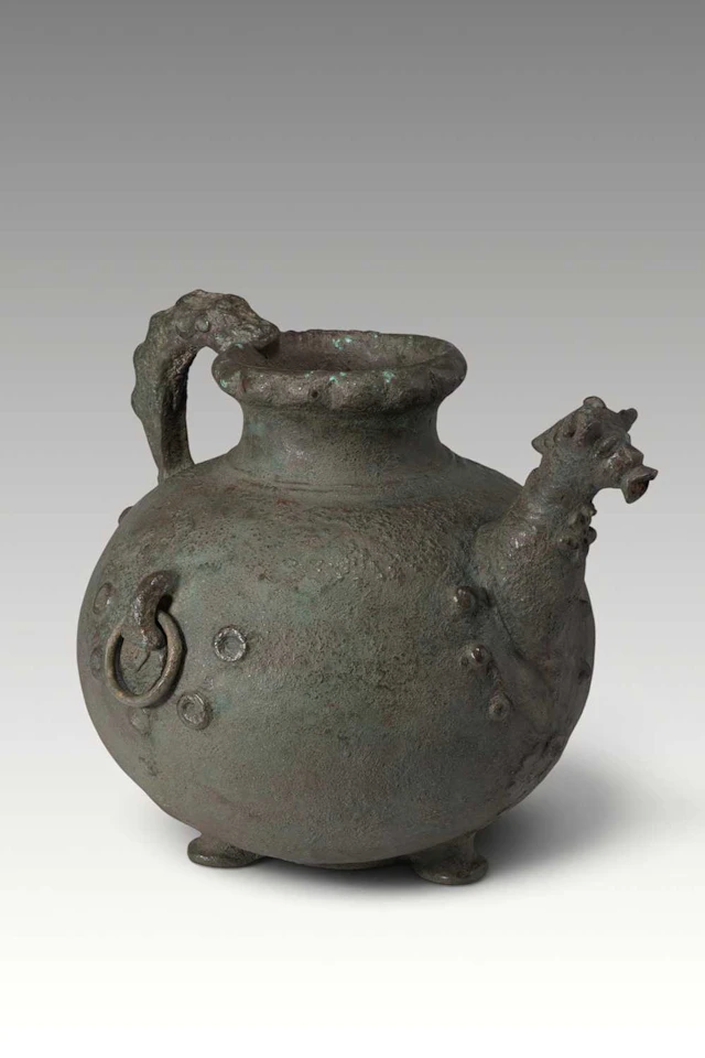 LARGE URARTIAN BRONZE JUG WITH ANIMAL PROTOME