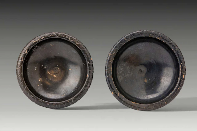 PAIR OF GREEK BLACK-GLAZED SHALLOW BOWLS
