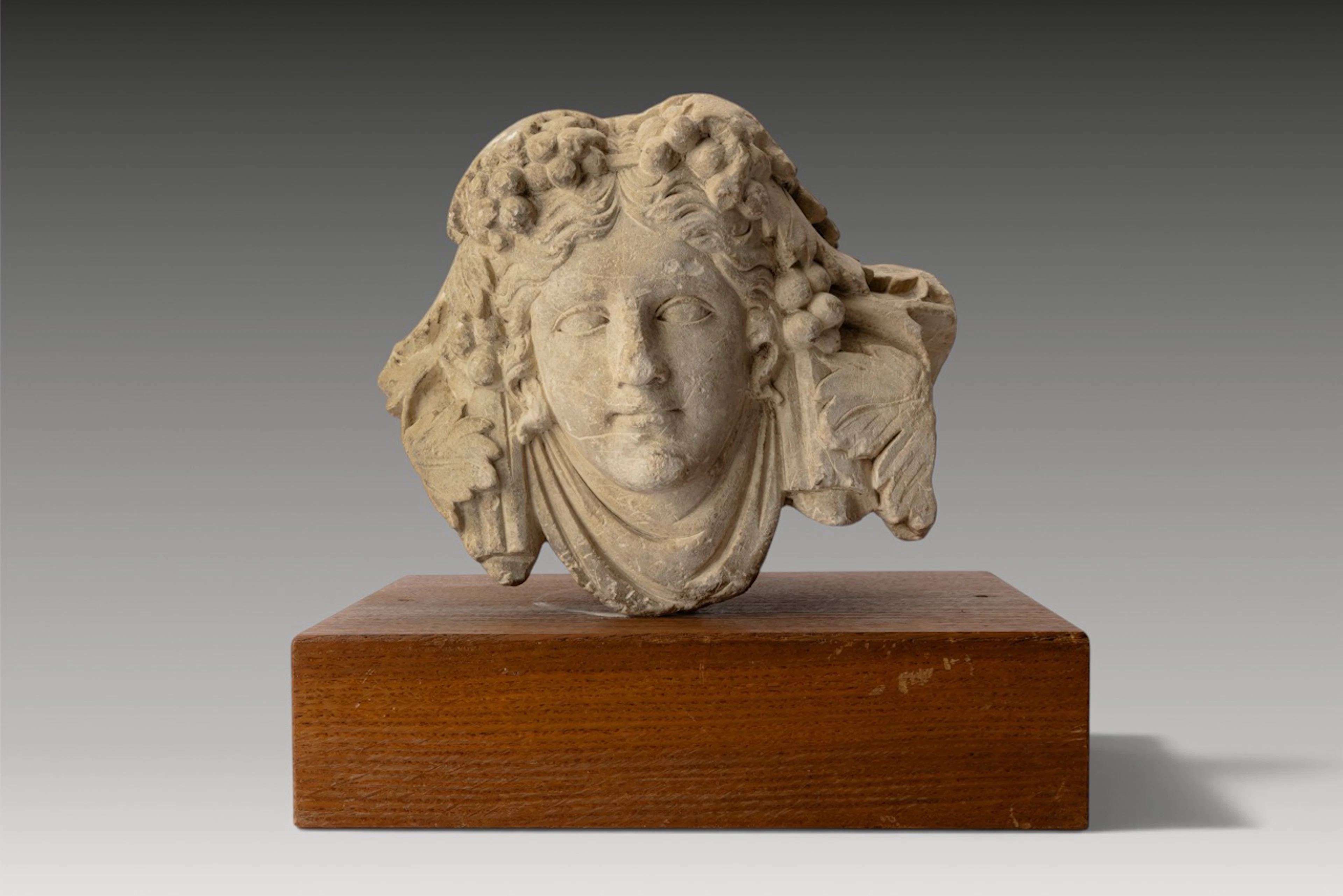 ROMAN STONE RELIEF PANEL OF YOUNG DIONYSUS