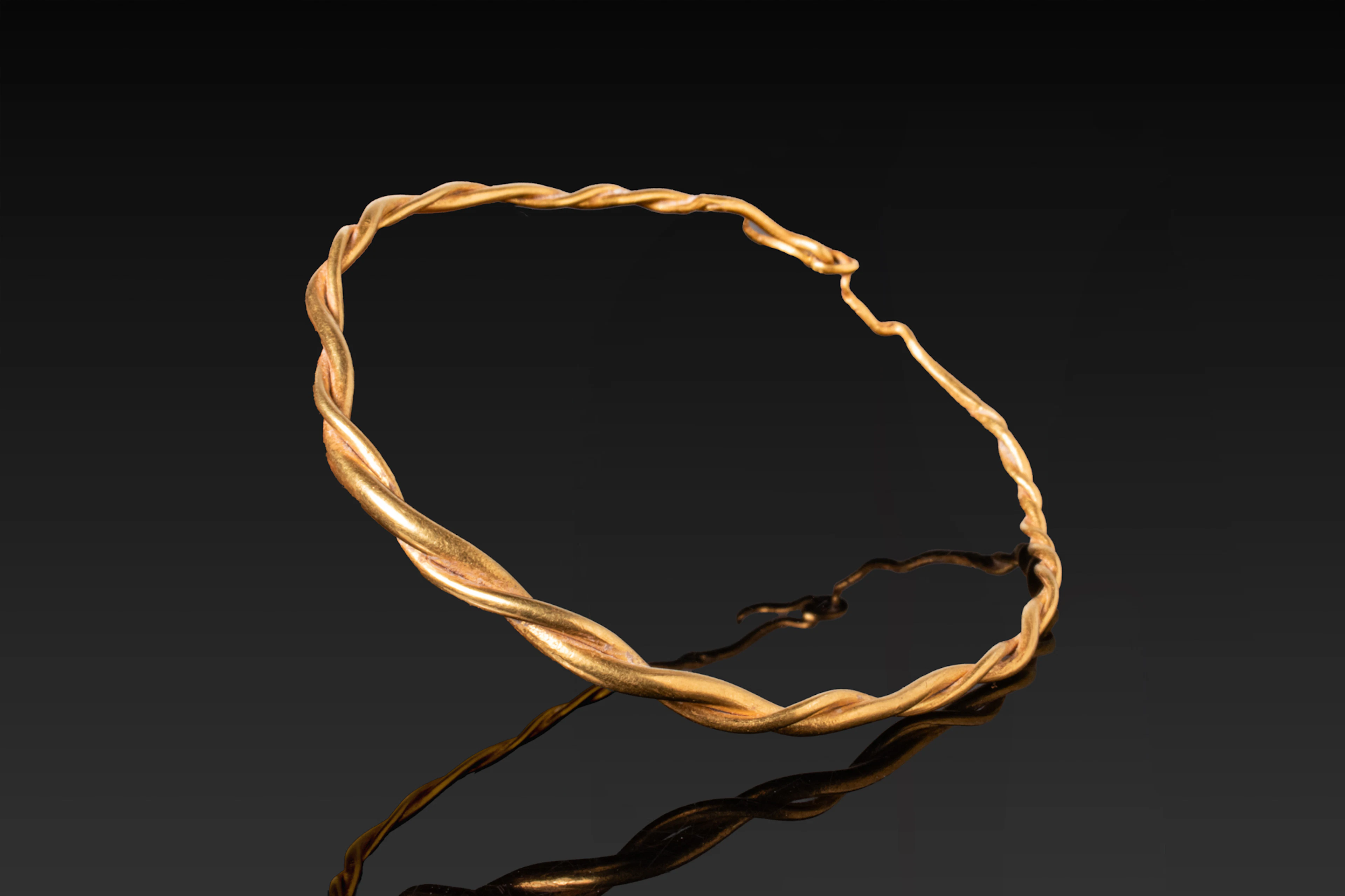 HELLENISTIC HIGH KARAT GOLD COILED BRACELET
