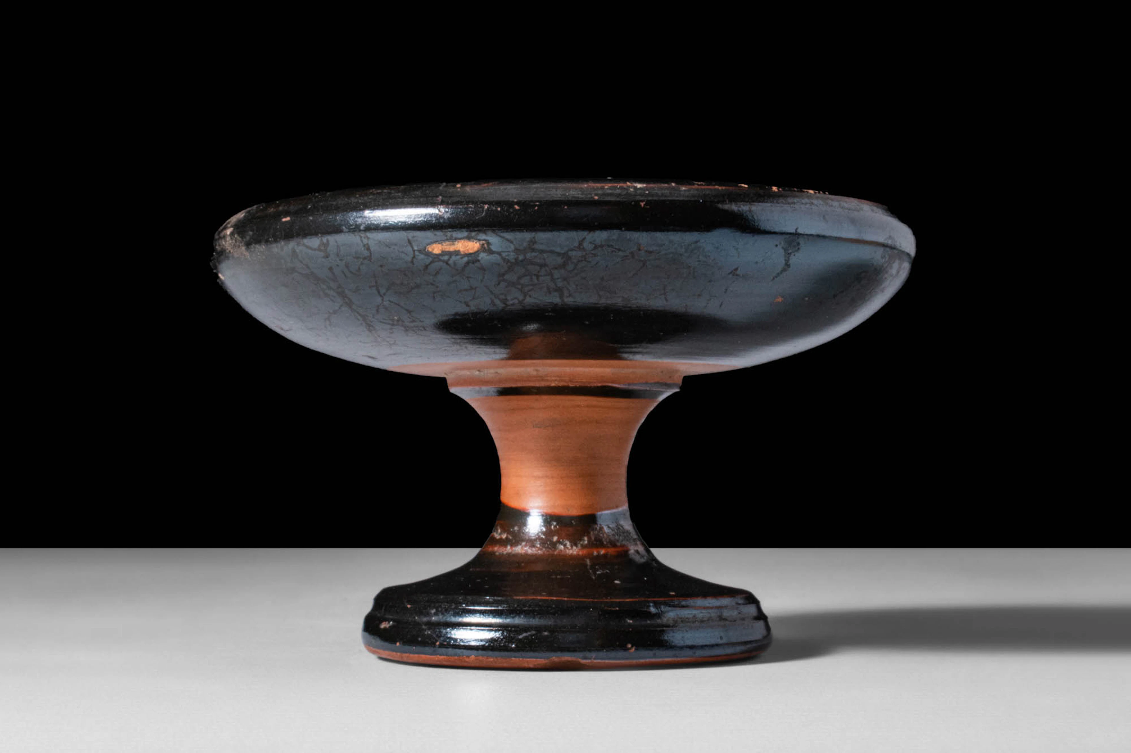 ATTIC BLACK-GLAZED POTTERY CUP ON STAND