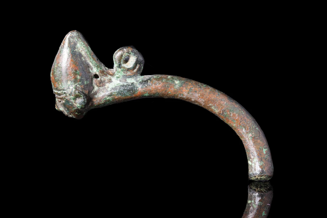 EGYPTIAN PTOLEMAIC BRONZE HANDLE WITH HEAD OF PHARAOH