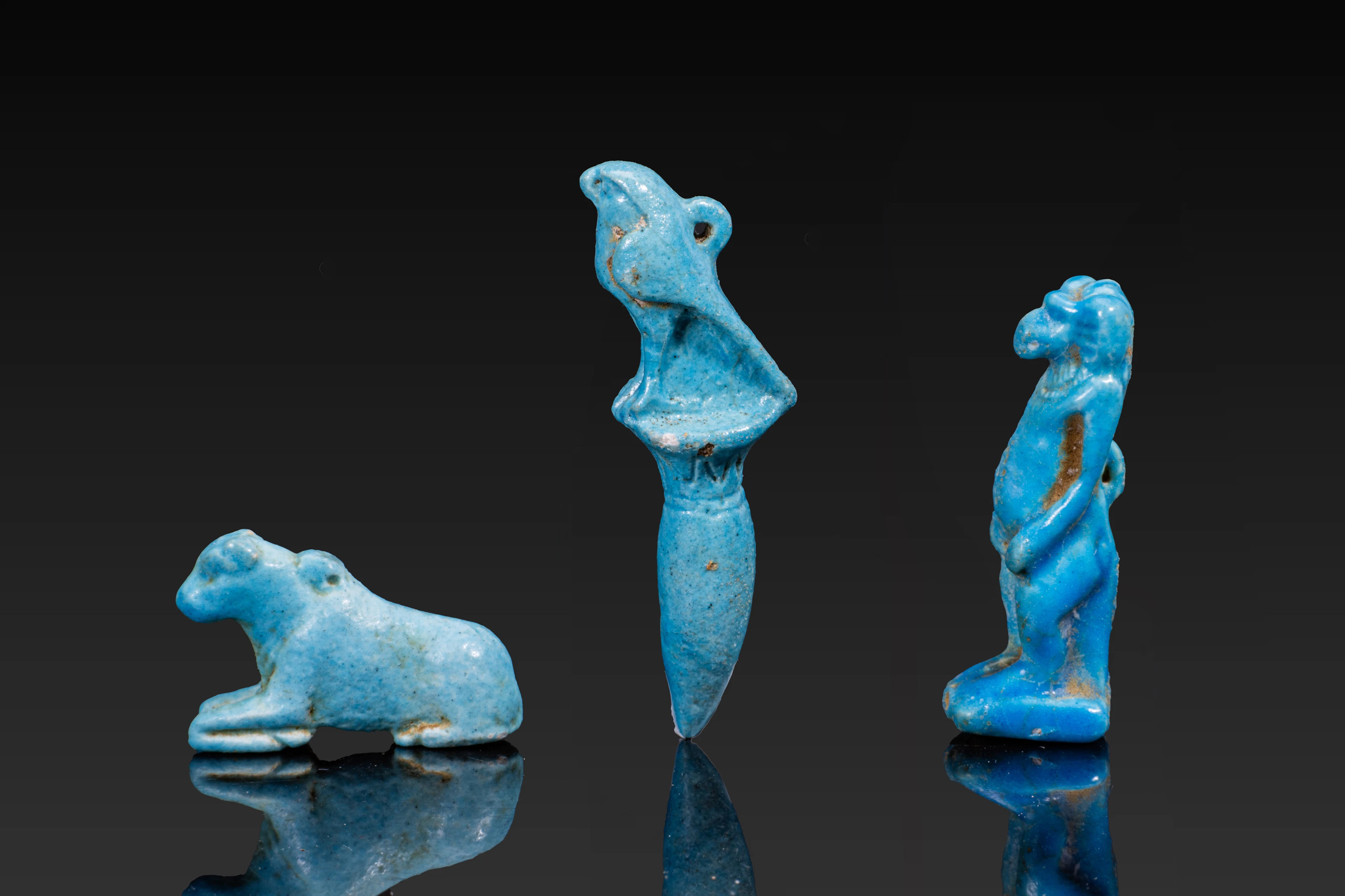 COLLECTION OF EGYPTIAN BLUE FAIENCE AMULETS