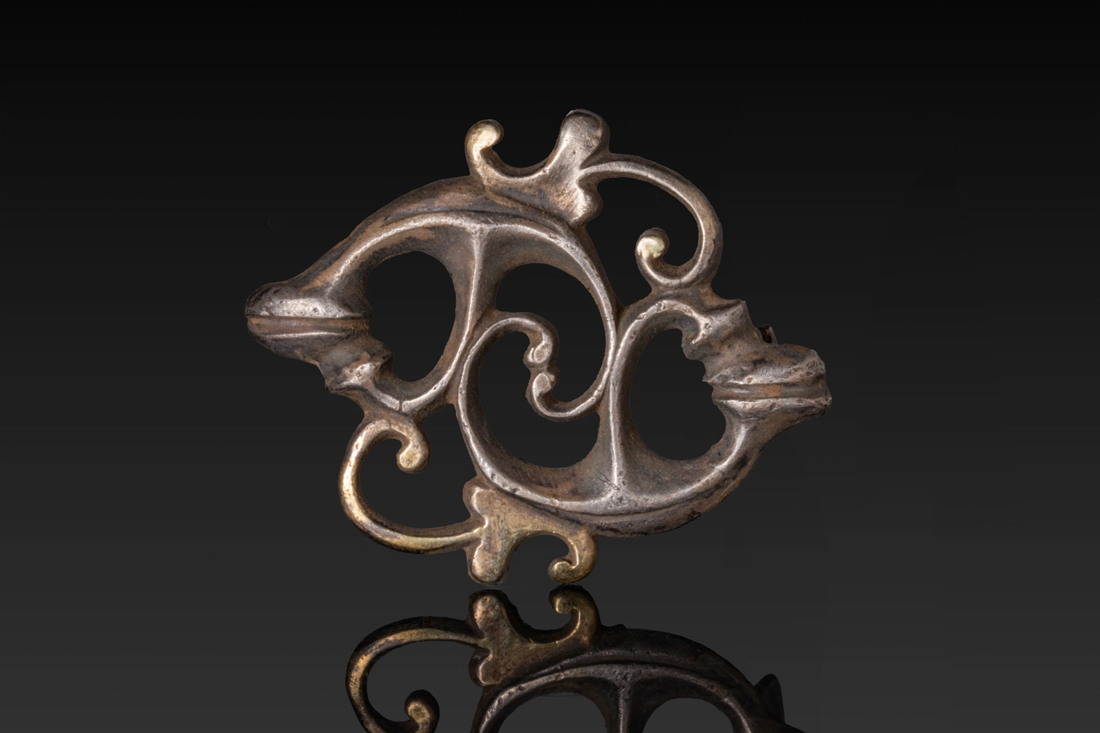 ROMAN SILVER-GILT PHYTOMORPHIC BROOCH