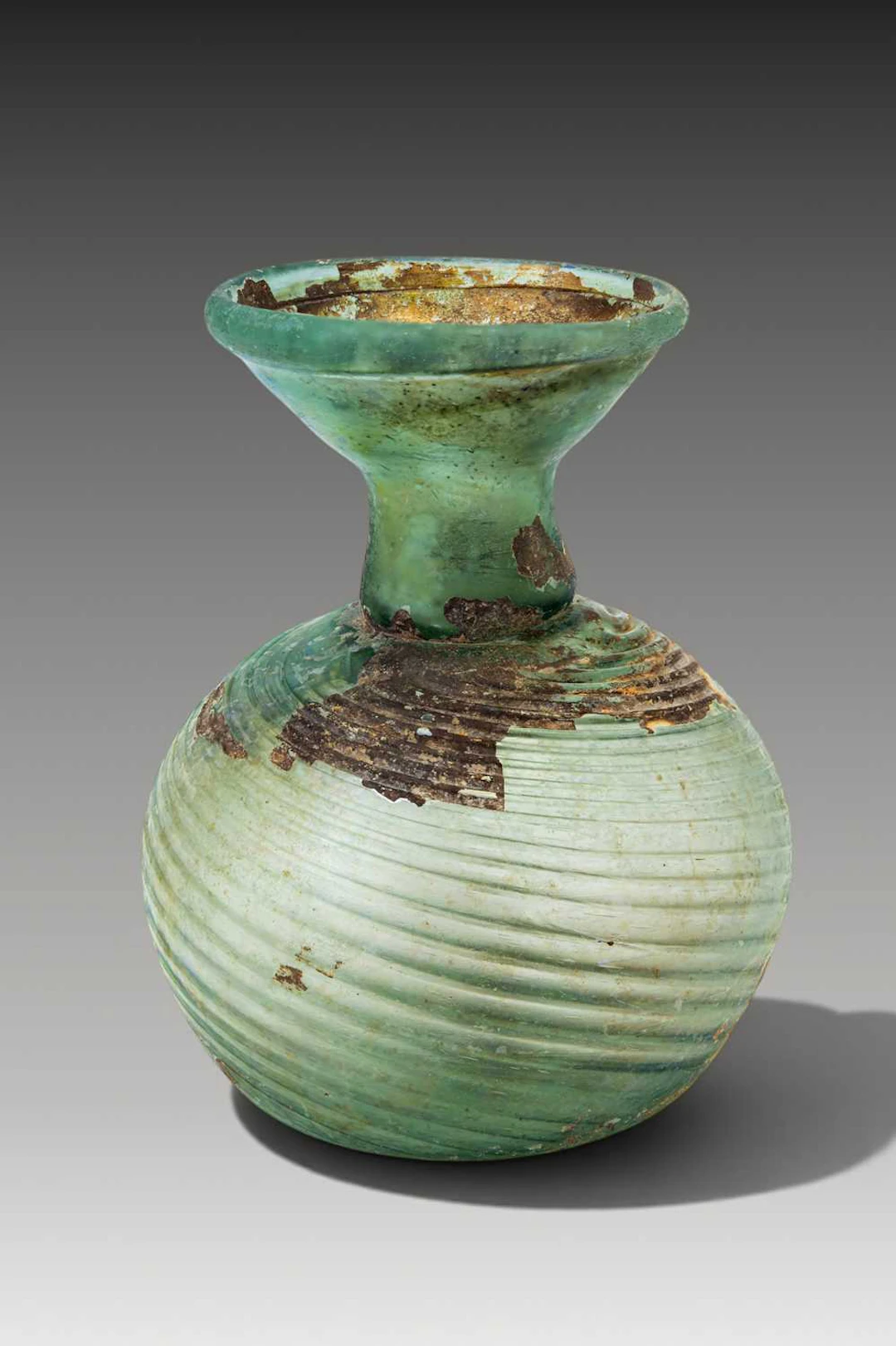 ROMAN GLASS APPLE-SHAPED FLASK