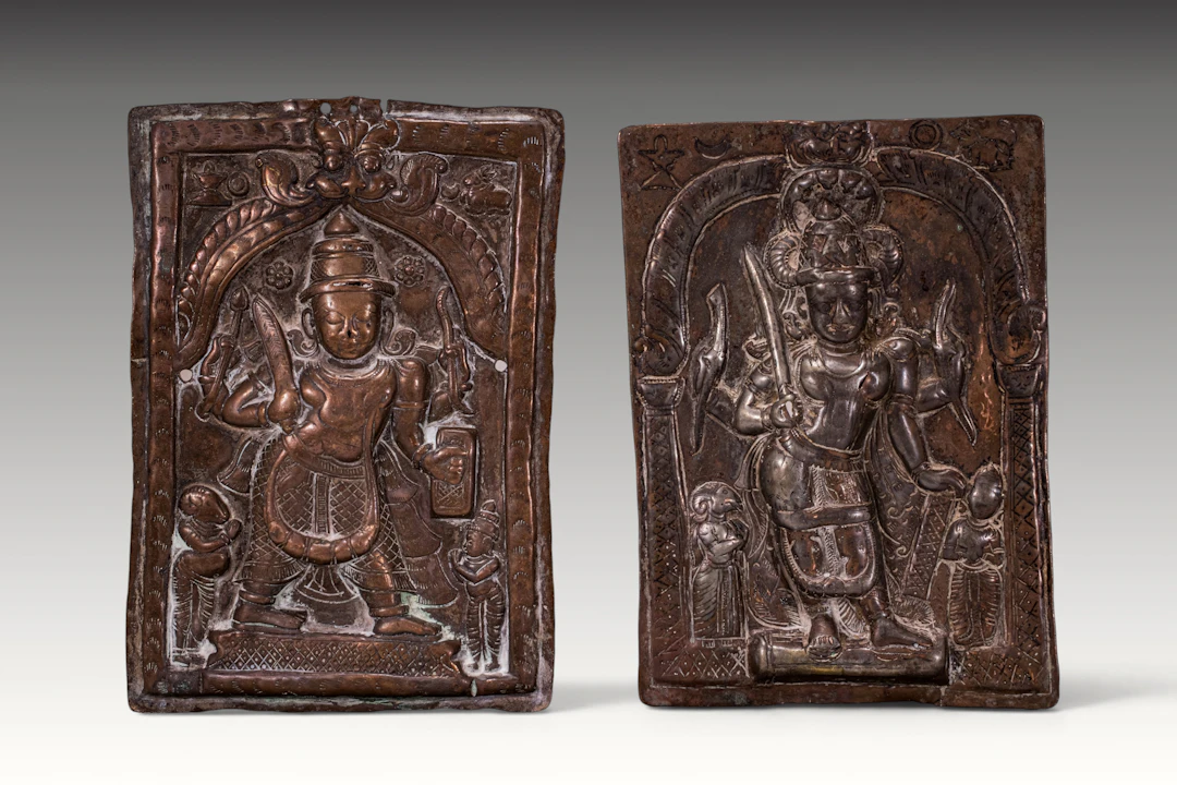 PAIR OF CEREMONIAL COPPER SHIELDS DEPICTING VIRABHADRA