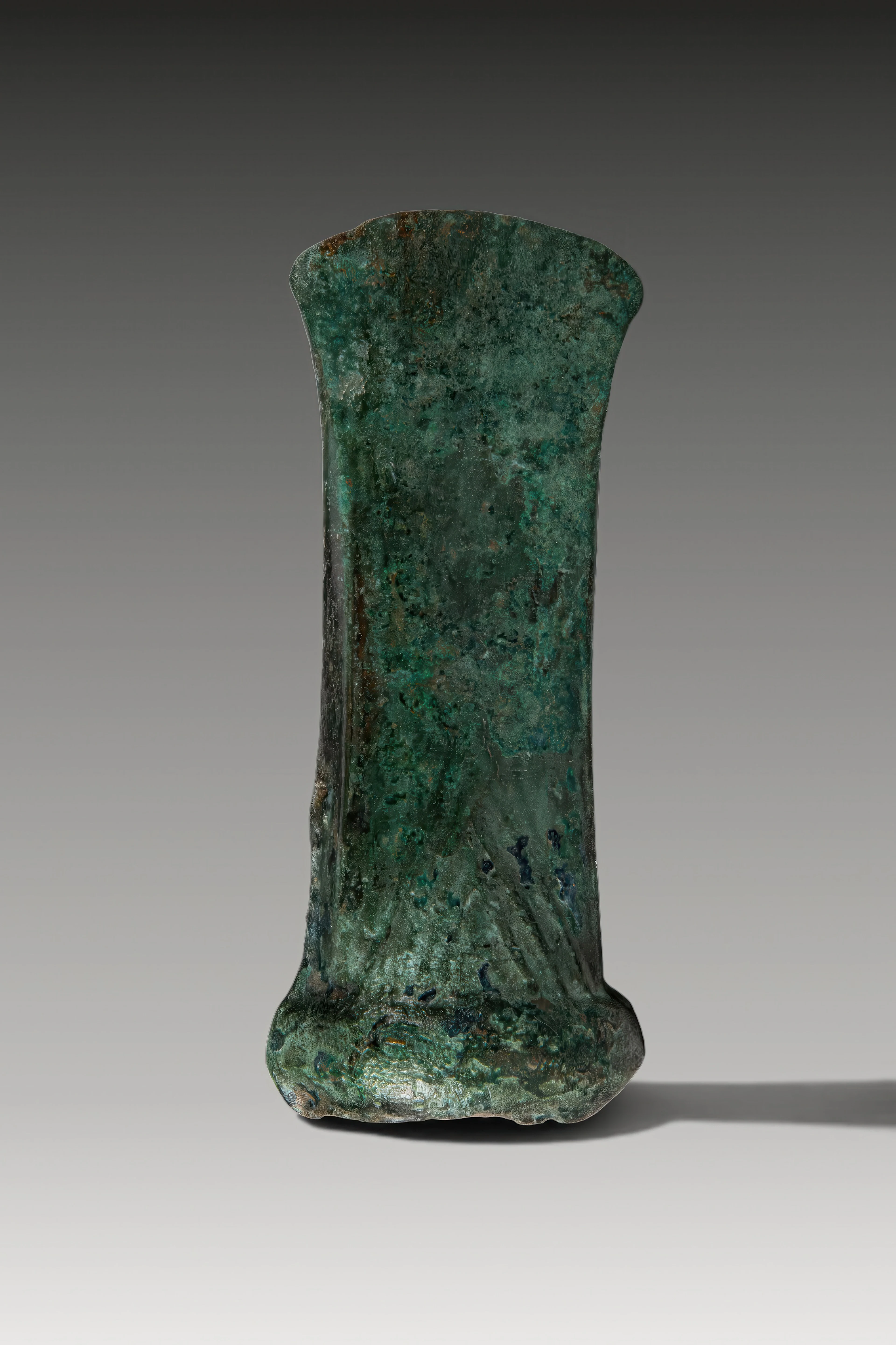 CELTIC BRONZE SOCKETED AXE HEAD WITH TRIANGULAR MOTIF
