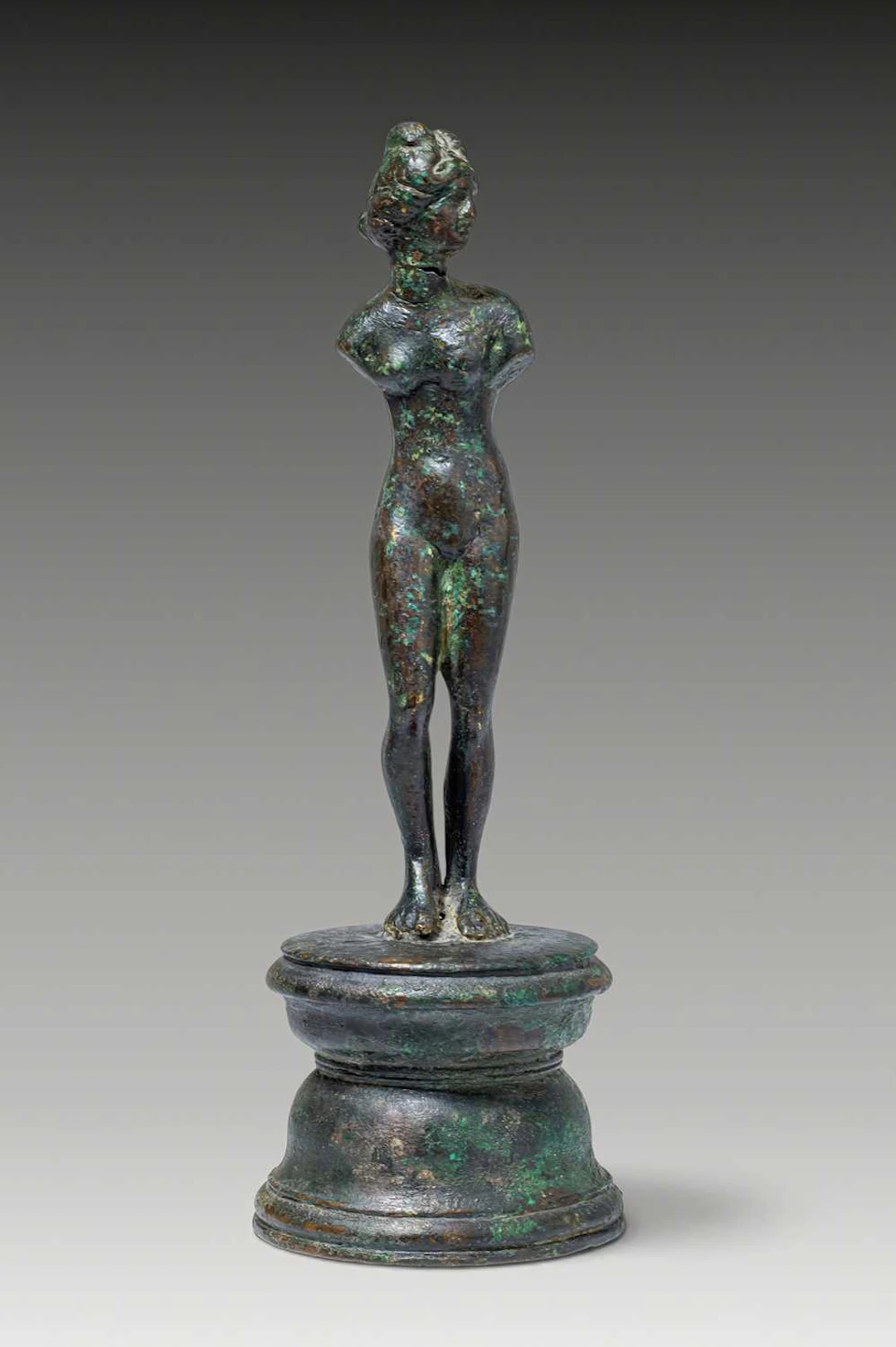 STUNNING ROMAN BRONZE FIGURINE OF VENUS AT THE BATH ON A PODIUM