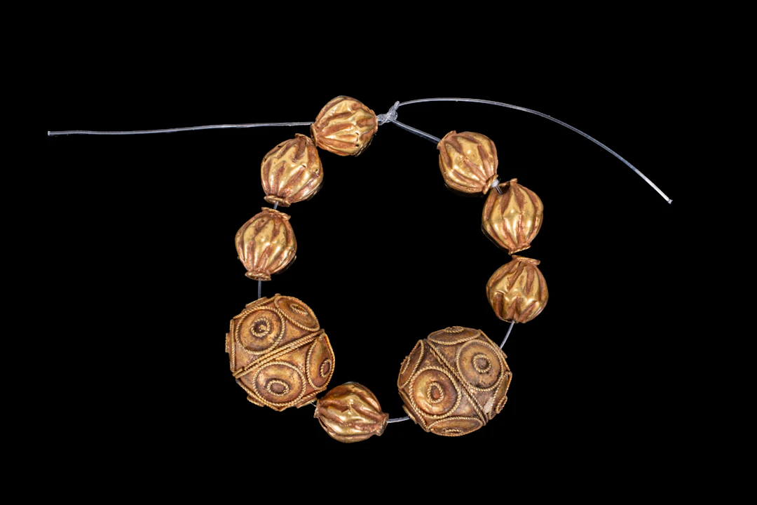 COLLECTION OF GREEK GOLD BEADS