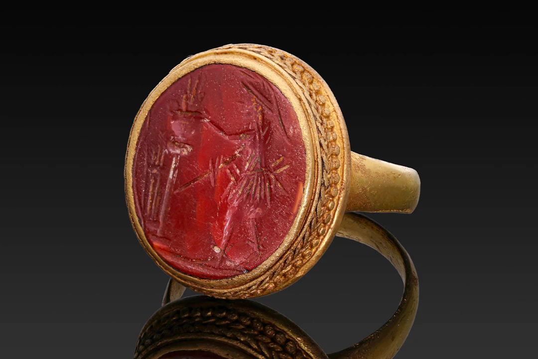 ROMAN CARNELIAN INTAGLIO OF PROMETHEUS AND THE FIRE IN GOLD RING