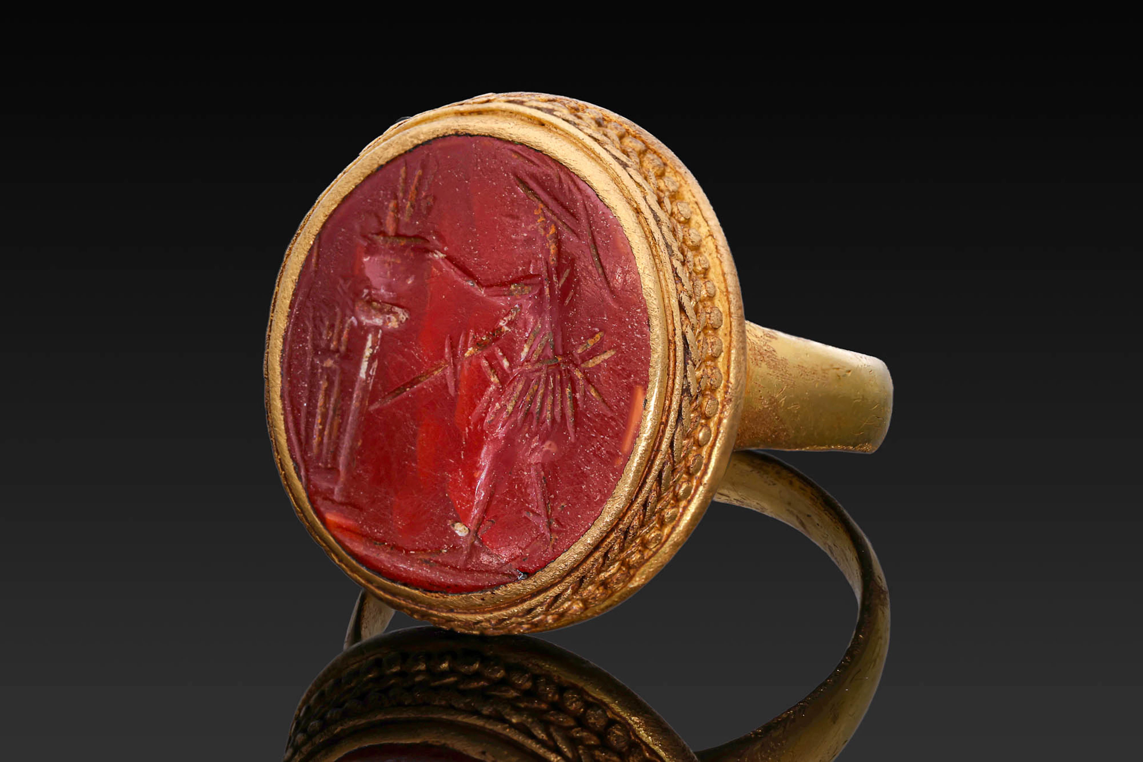 ROMAN CARNELIAN INTAGLIO OF PROMETHEUS AND THE FIRE IN GOLD RING