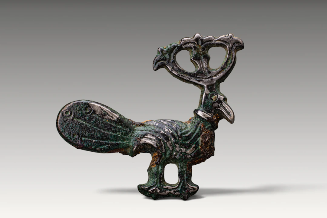 RARE VIKING SILVER-INLAID BRONZE PHOENIX-SHAPED BROOCH