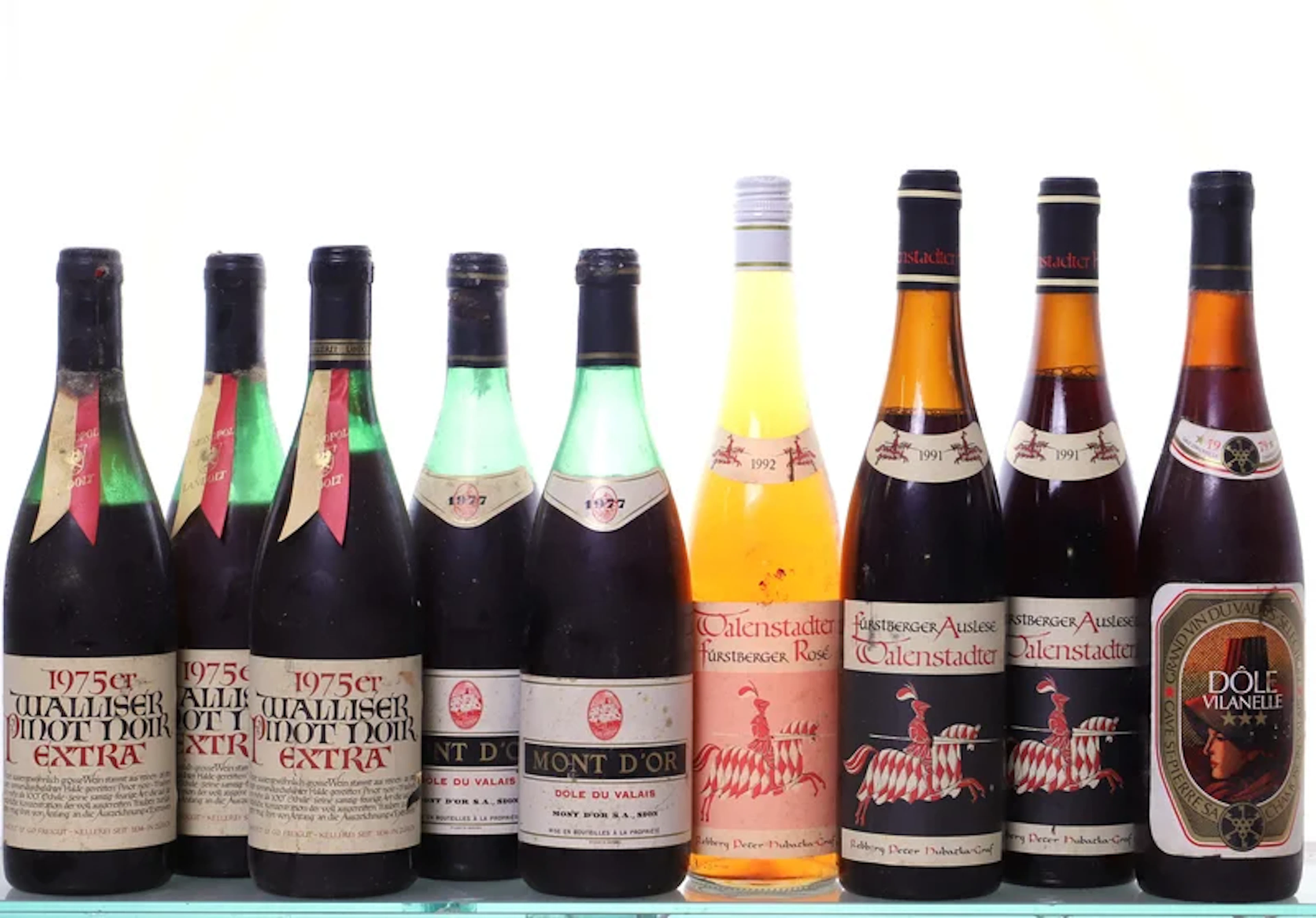 9 Flaschen. SCHWEIZ mixed 1975-1992.