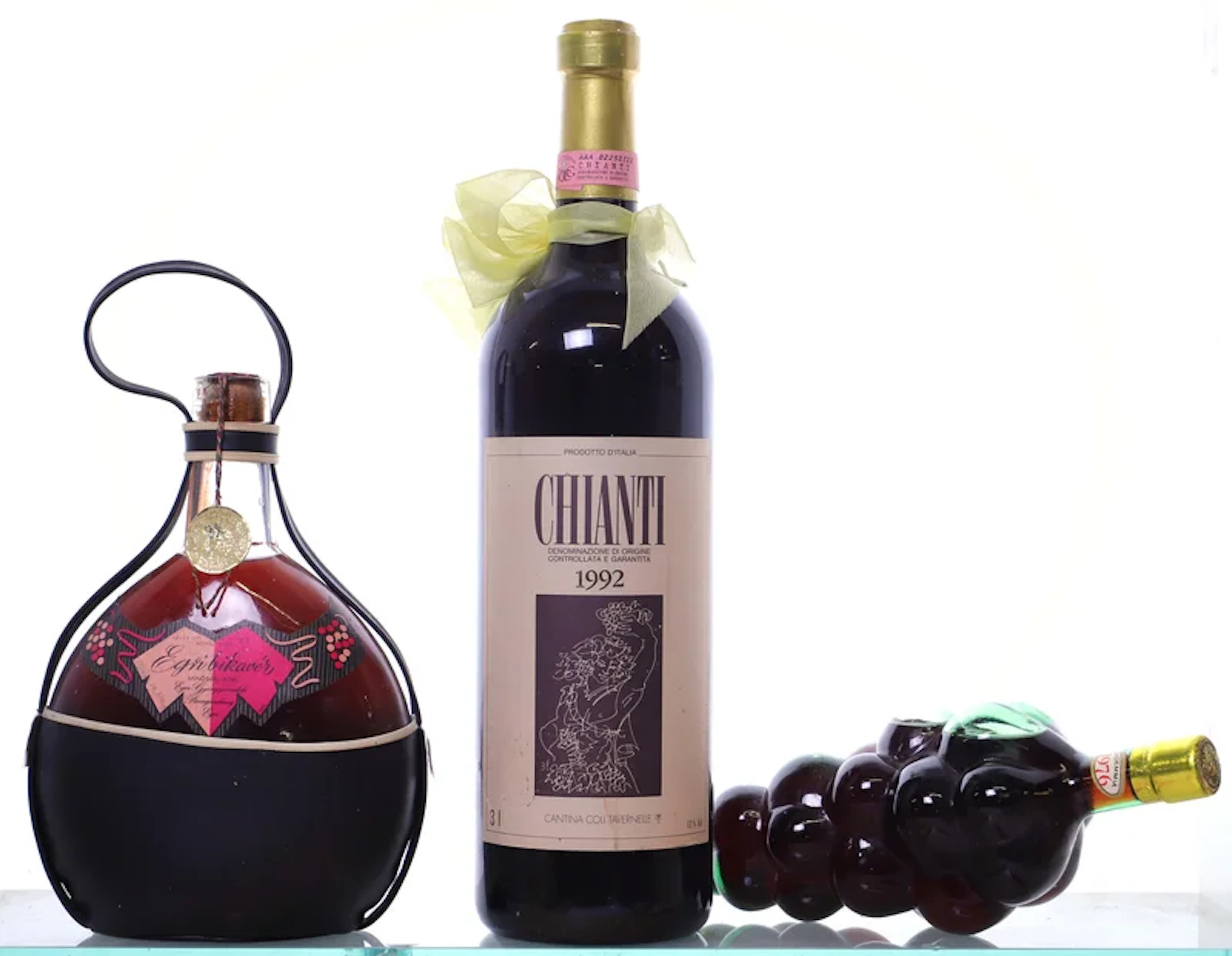 3 bottles various size. Decorative wine mixed.