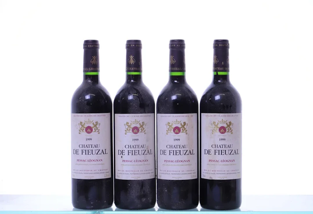 4 bottles. Château de Fieuzal rouge Pessac-Léognan, 1999.