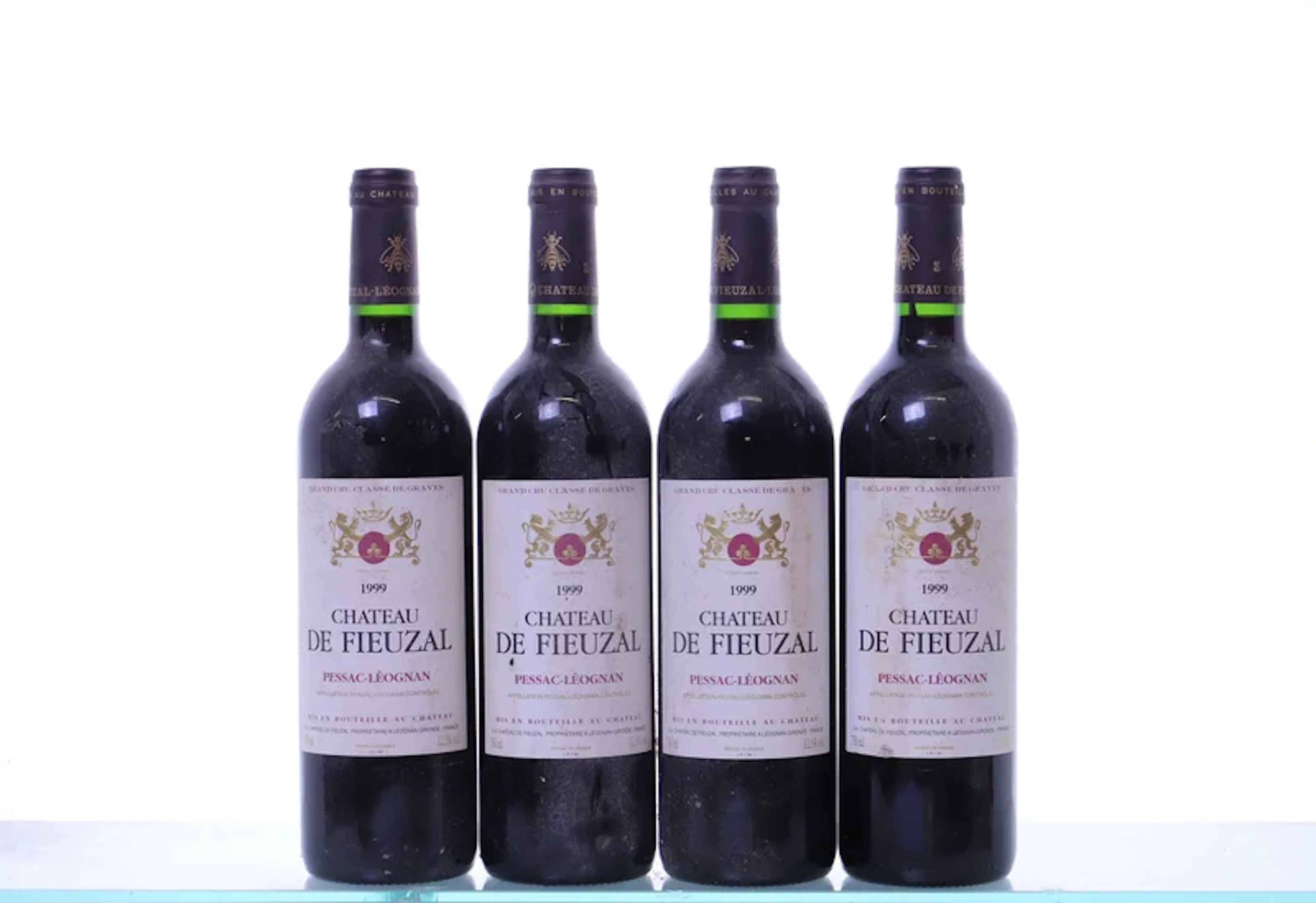 4 bottles. Château de Fieuzal rouge Pessac-Léognan, 1999.