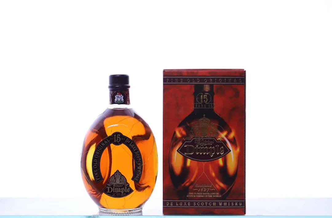 1 bottle 100cl OC. WHISKY Blended Scotch Whisky, Dimple 15 years old. 43%.