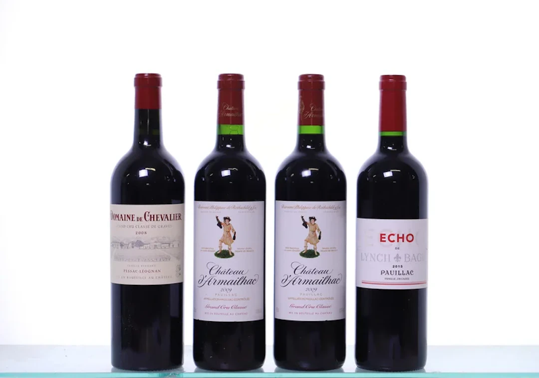 4 bottles. Bordeaux mixed. 1x 2008 Dom. de Chevalier rouge, 2x 2009