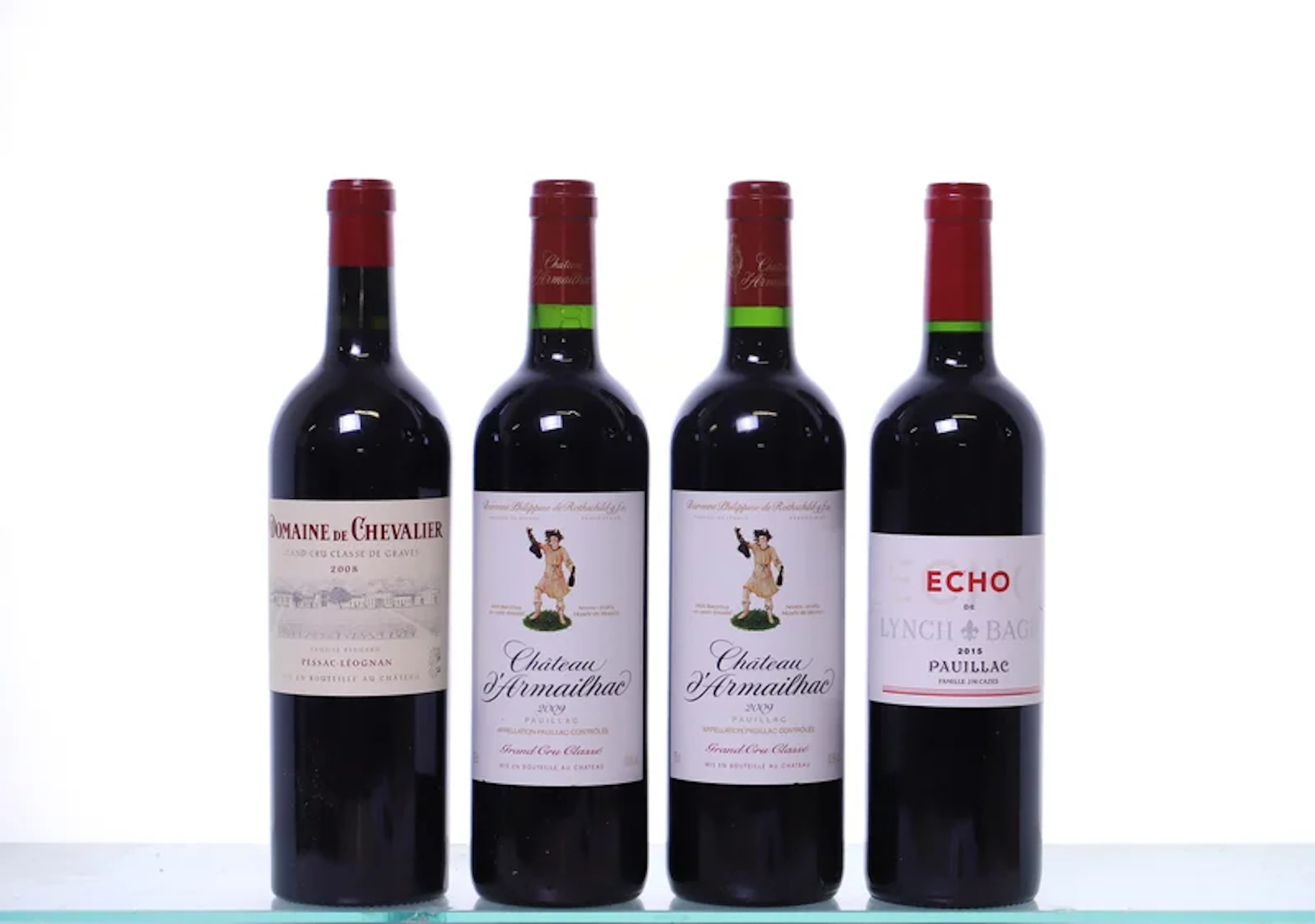 4 bottles. Bordeaux mixed. 1x 2008 Dom. de Chevalier rouge, 2x 2009