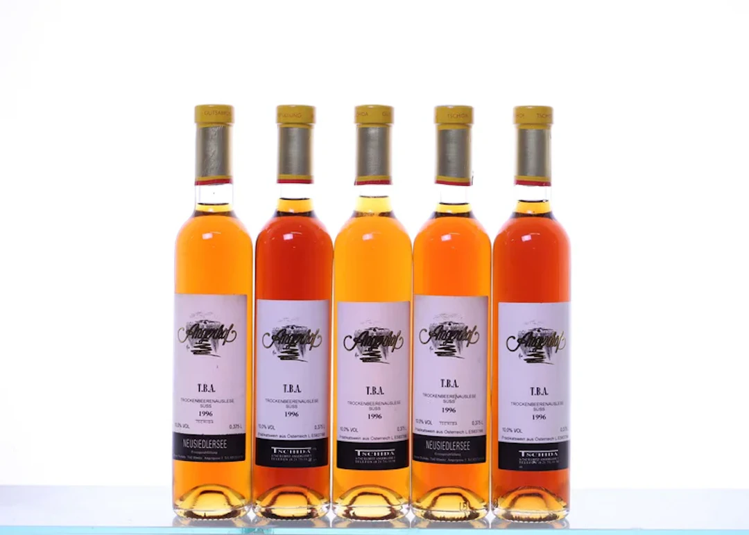 5 half bottles. TSCHIDA, Angerhof, Trockenbeerenauslese, 1996.