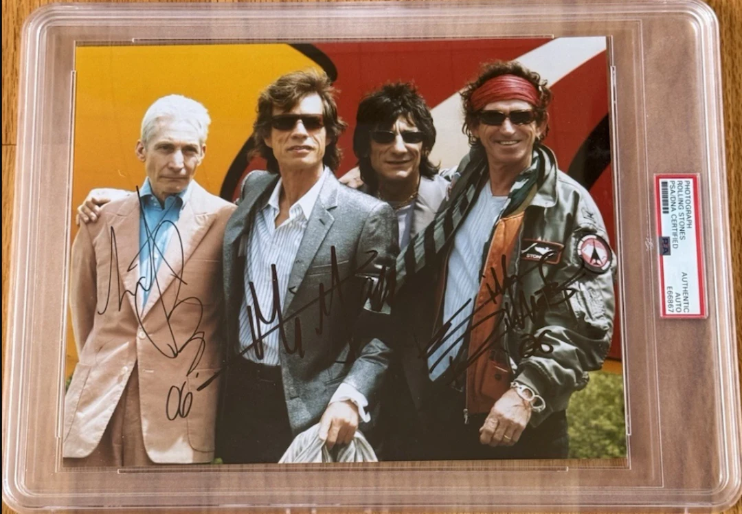 The Rolling Stones Group Signed 8" x 10" Photo (3 Sigs) (PSA/DNA Encapsulated)