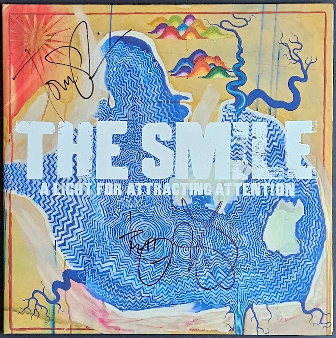The Smile Fully Group Signed “A Light for Attracting Attention” Album