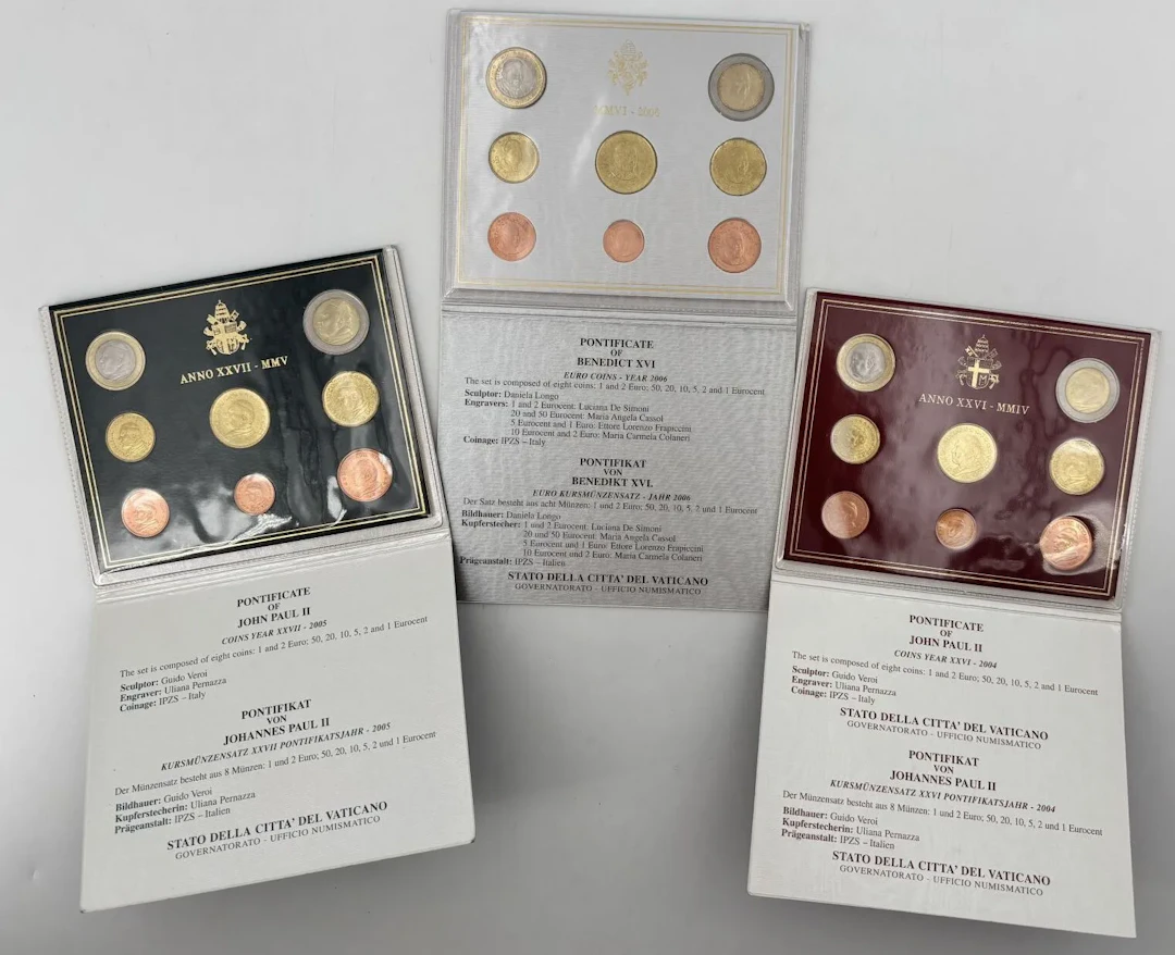 Three sets of collectible euro coins, including: - Lot 70