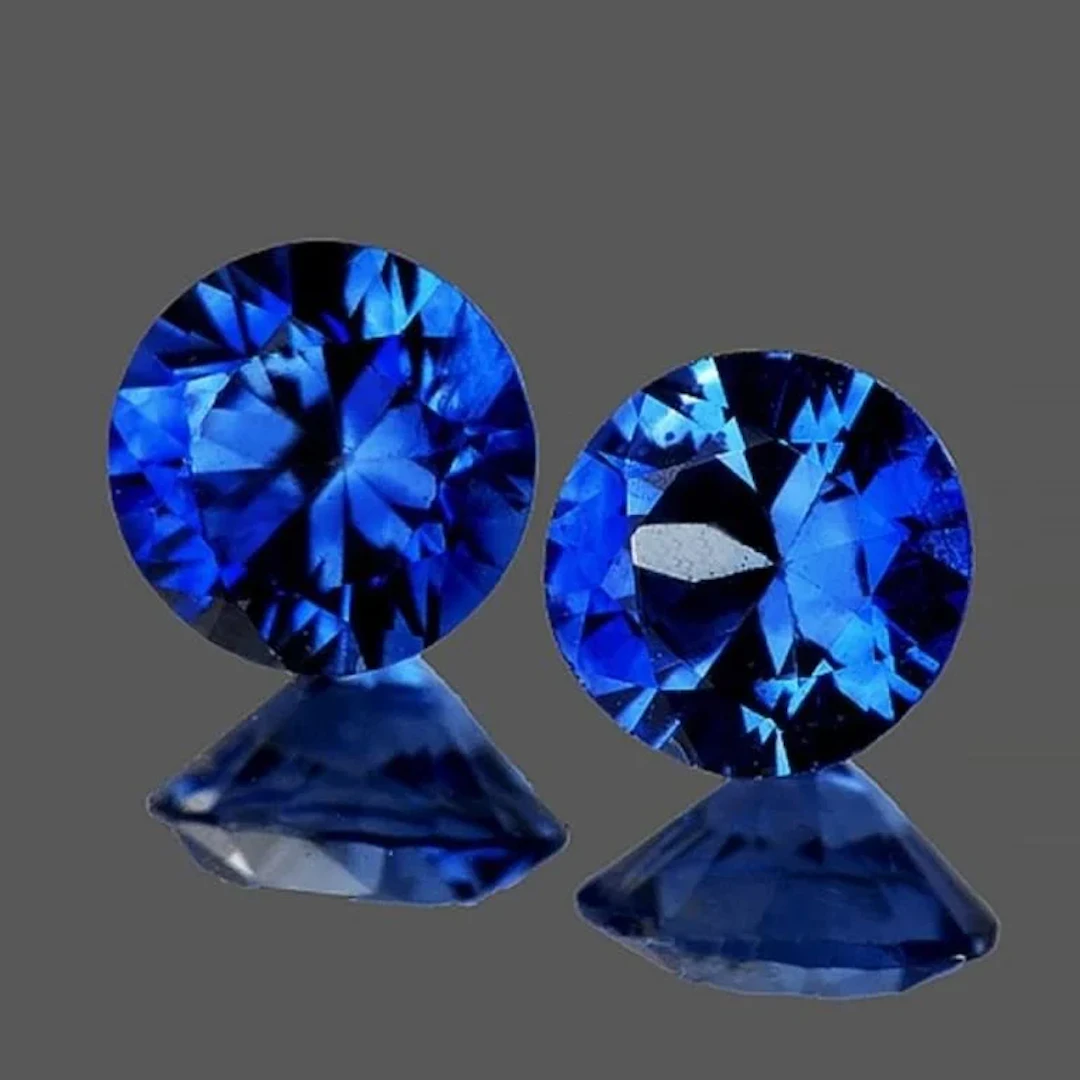 Natural Intense Blue Sapphire Pair 1.27 Cts [Flaw