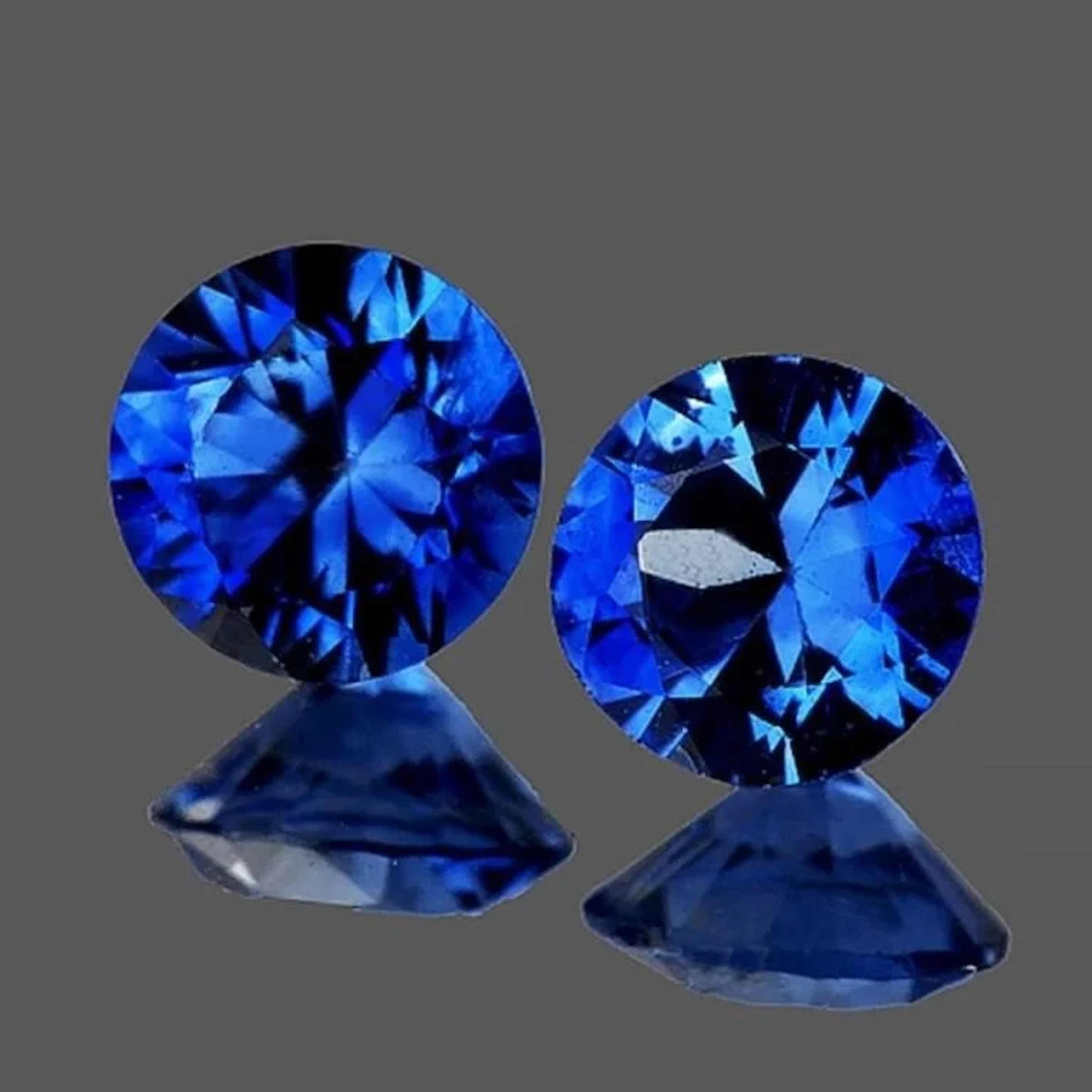Natural Intense Blue Sapphire Pair 1.27 Cts [Flaw