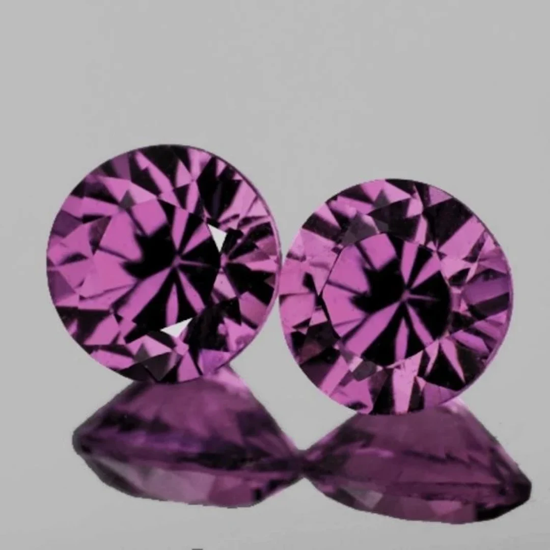 Natural Intense Violet Pink Burma Spinel Pair{Flaw
