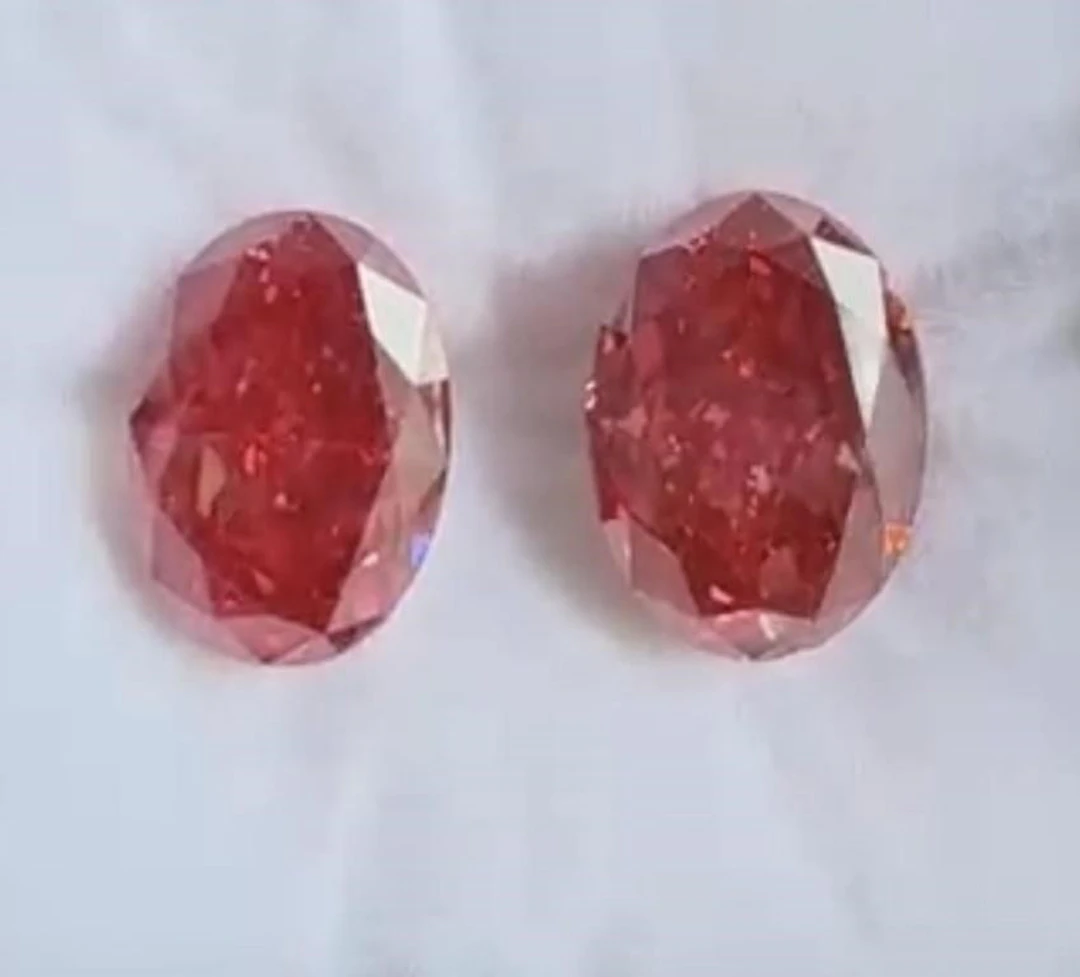 Matching Vivid Pink Diamond Pair 16.53 Cts VS IGI