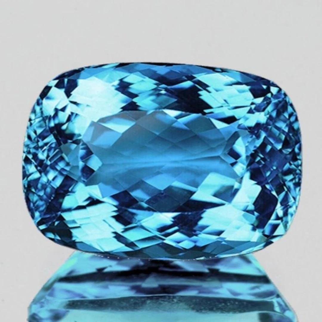 Natural Cushion Sky Blue Topaz {Flawless-VVS1}