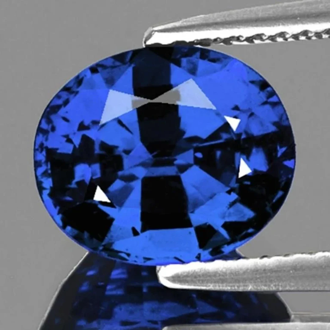 Natural Oval Royal Blue Sapphire { Flawless-VVS}