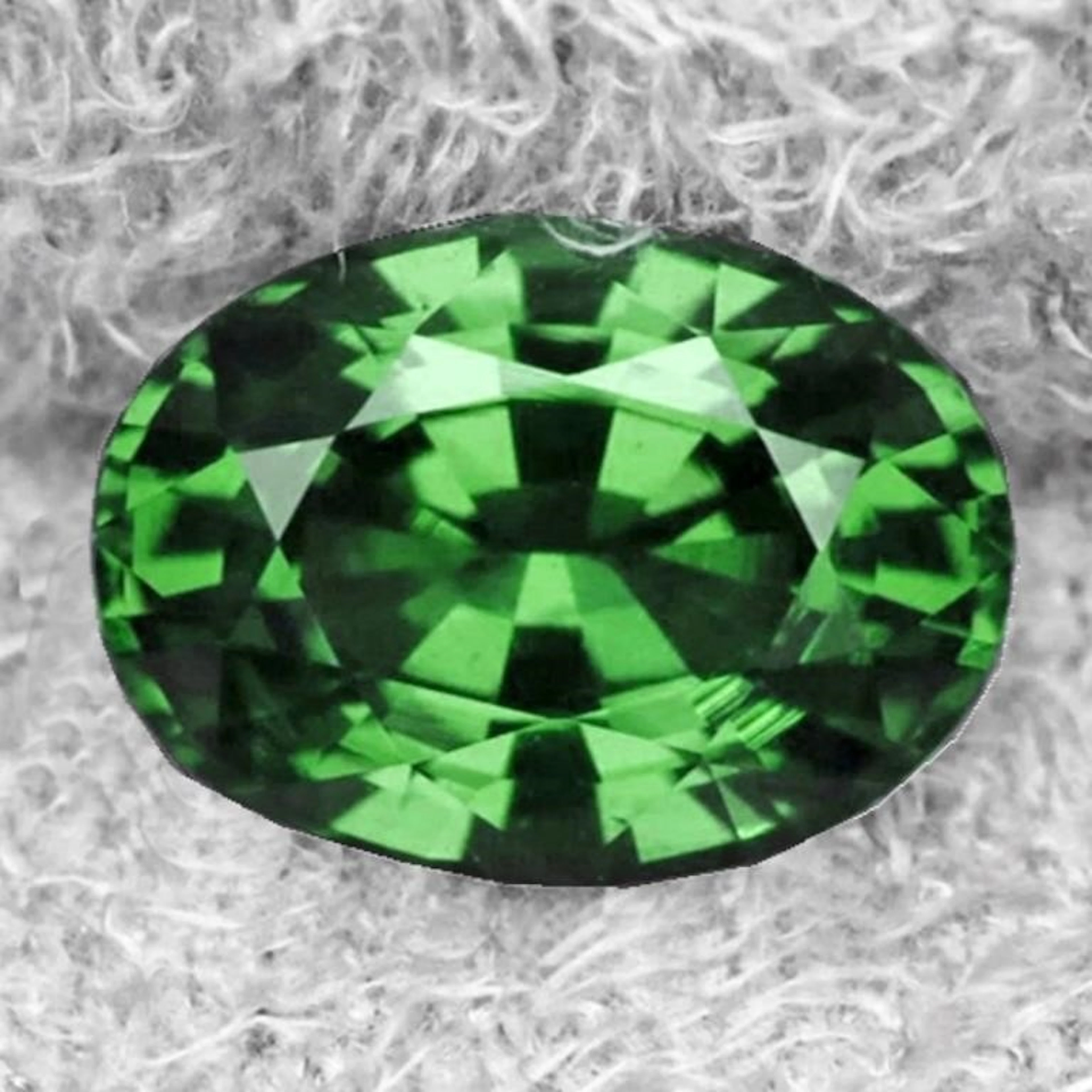 Natural Oval Green Sapphire {Flawless-VVS}
