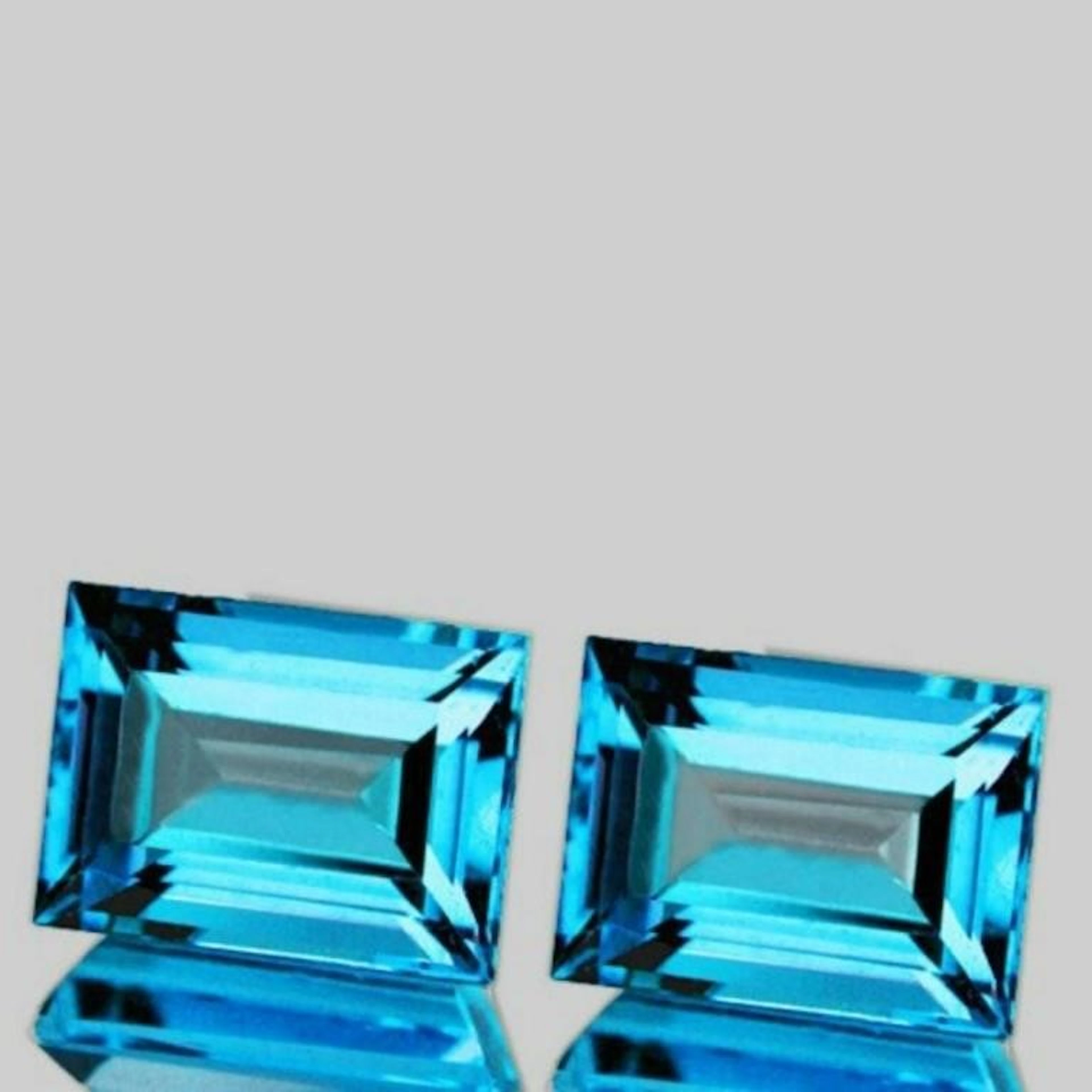 NATURAL BABY SWISS BLUE TOPAZ PAIR 12x9 MM [IF-VVS