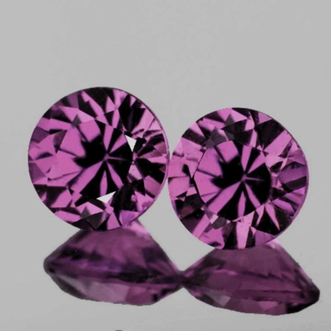 Natural Intense Violet Pink Burma Spinel Pair{Flaw