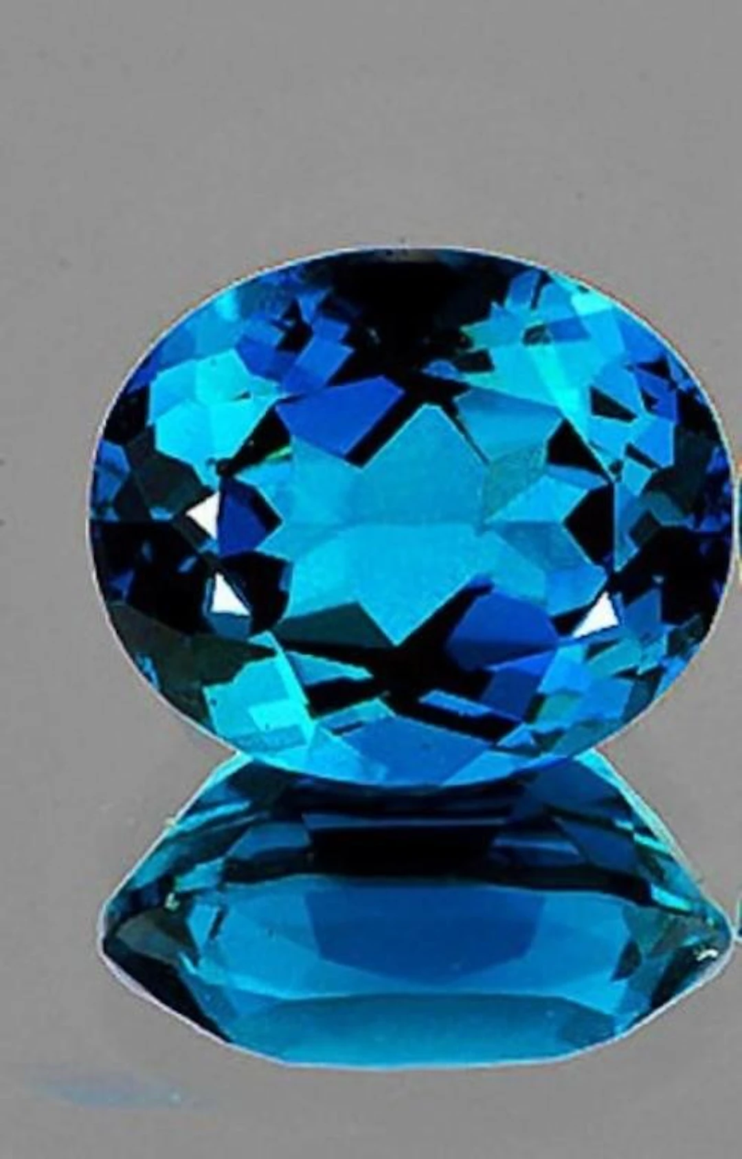 Natural London Blue Topaz [Flawless-VVS]
