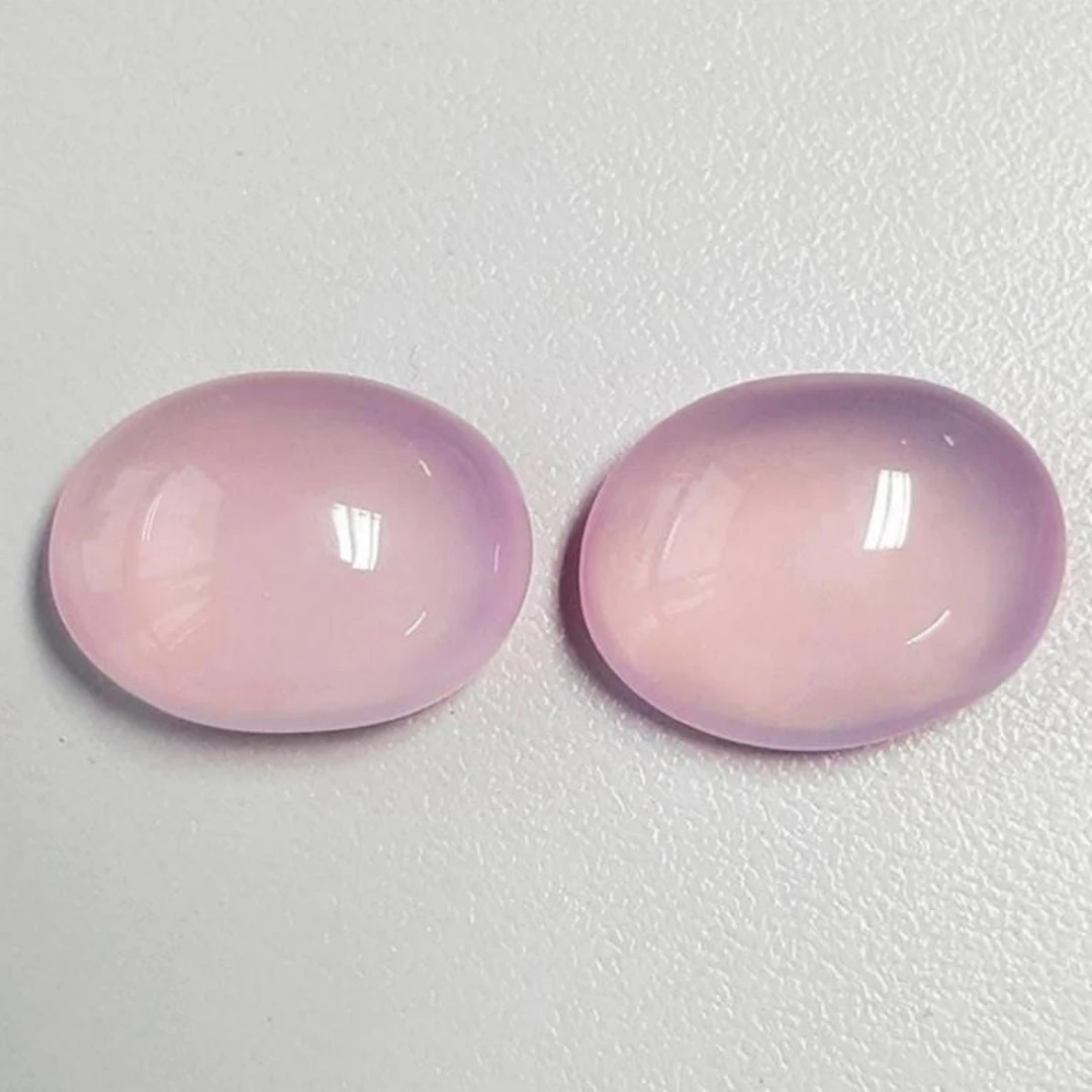 Natural Pastel Pink Rose Quartz Pair 31.14 CT Flaw