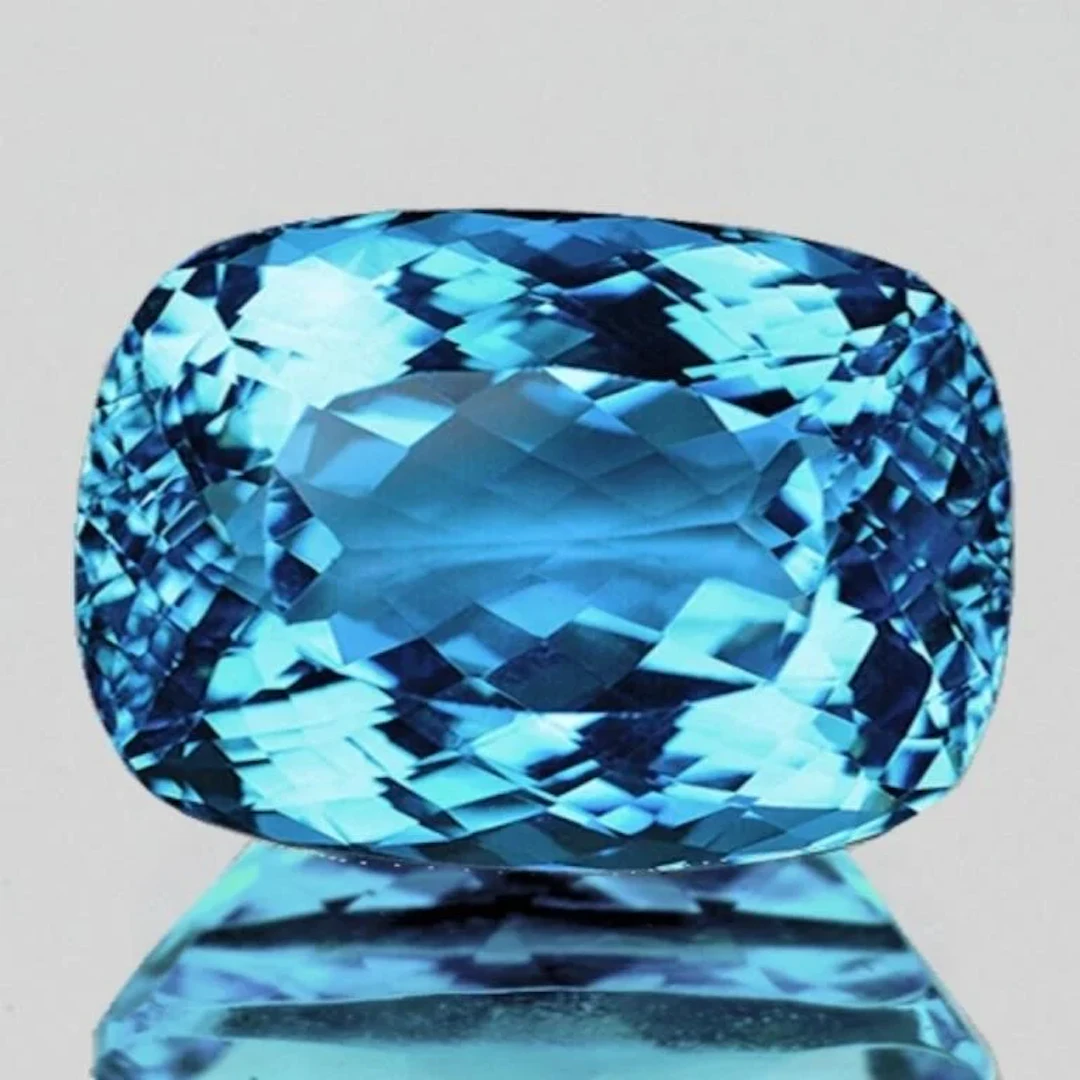 Natural Cushion Sky Blue Topaz {Flawless-VVS1}