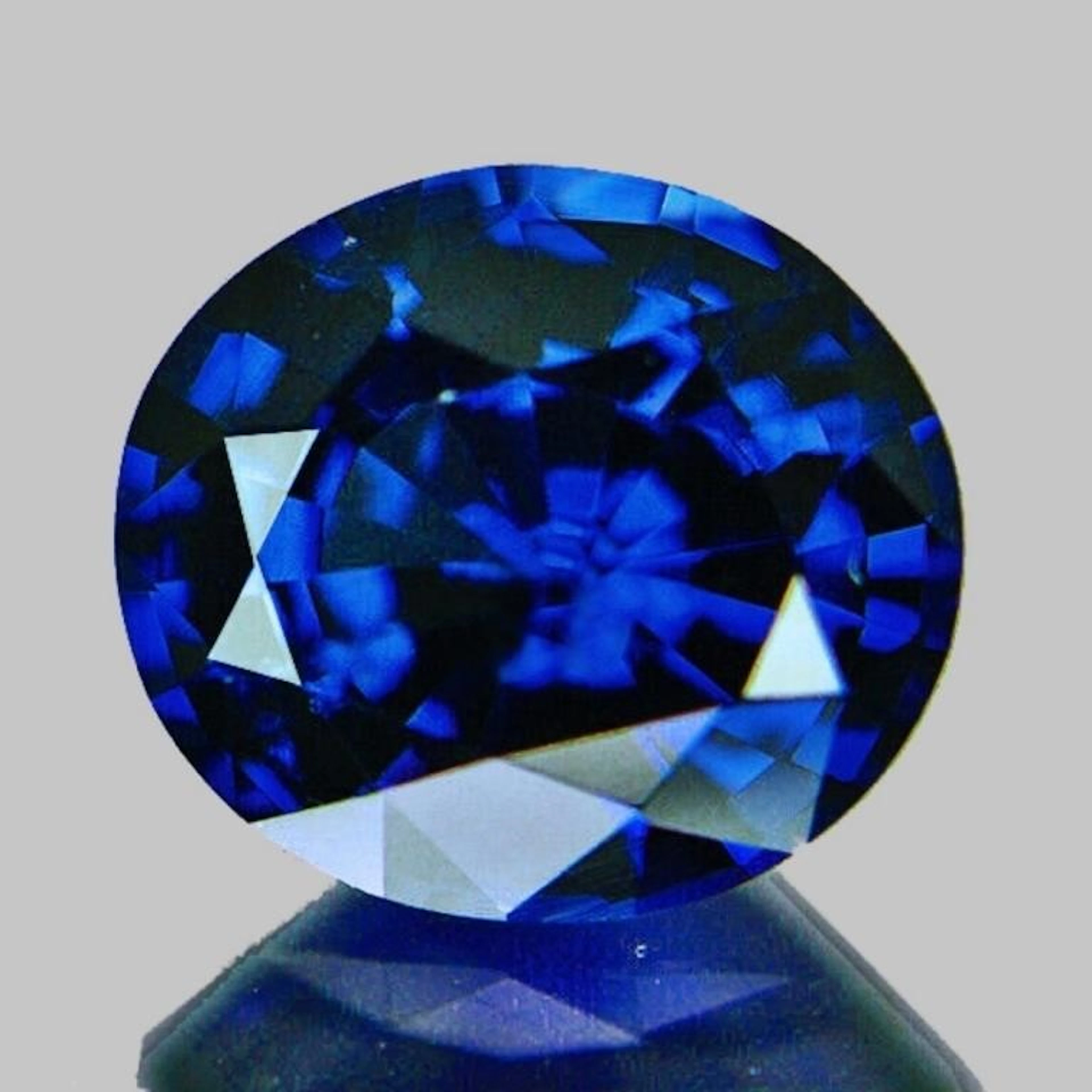 Natural Oval Royal Blue Sapphire {VVS}